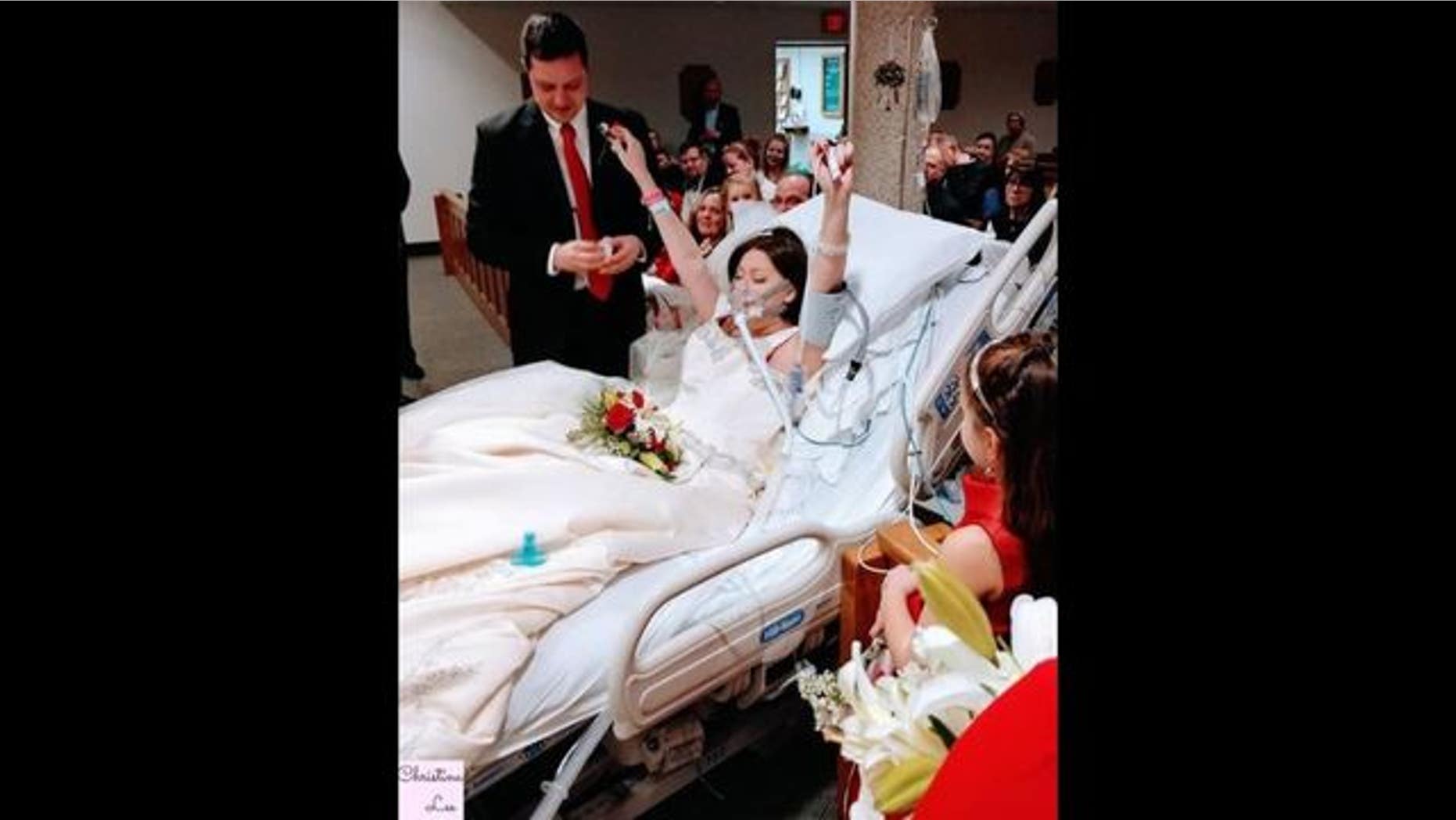 Heather Mosher was dressed in her wedding gown and lying in bed wearing an oxygen mask as she said 'I do.'