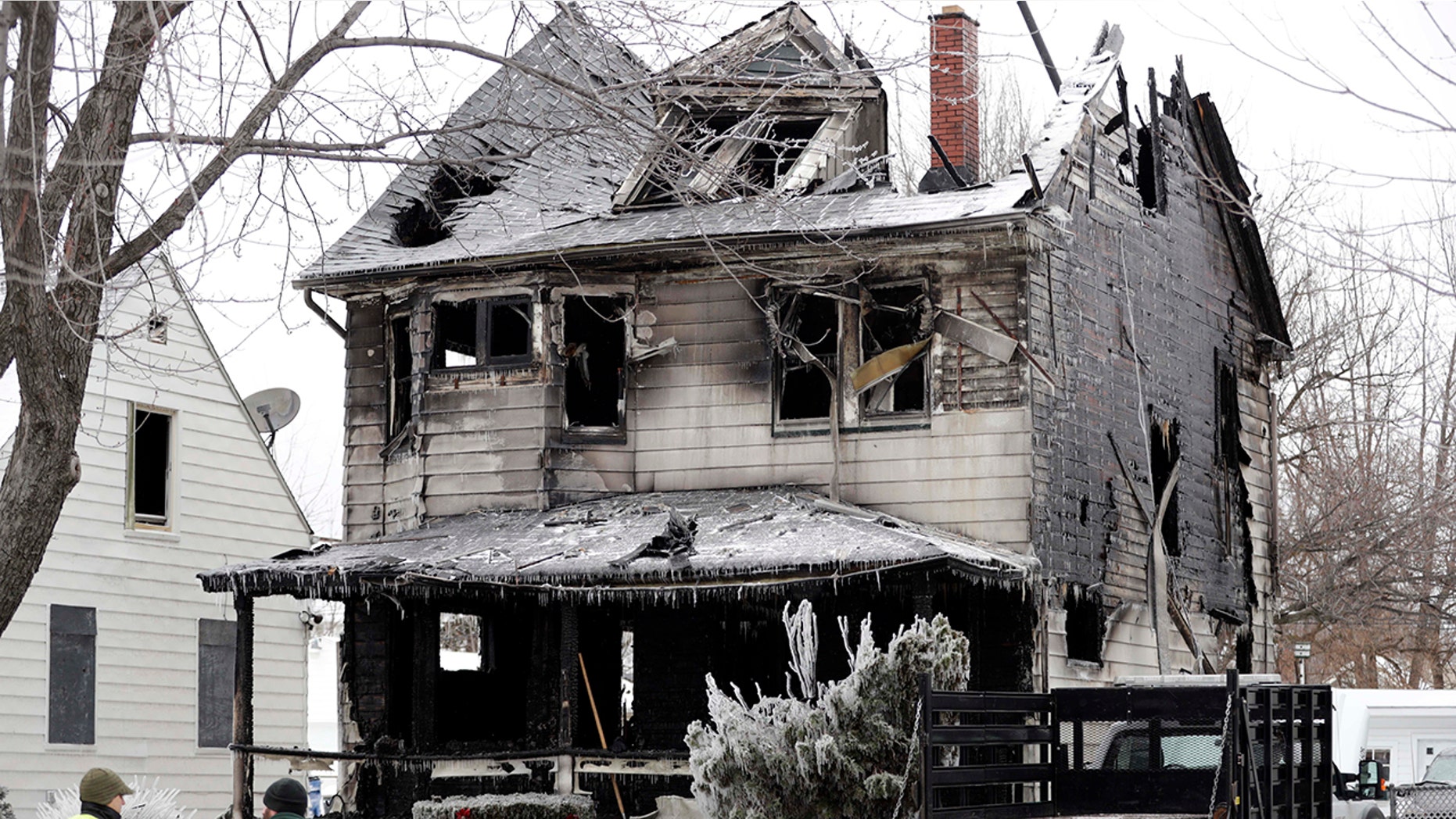Four bodies were found at the site of a house fire, Tuesday, Jan. 30, 2018, in Cleveland.