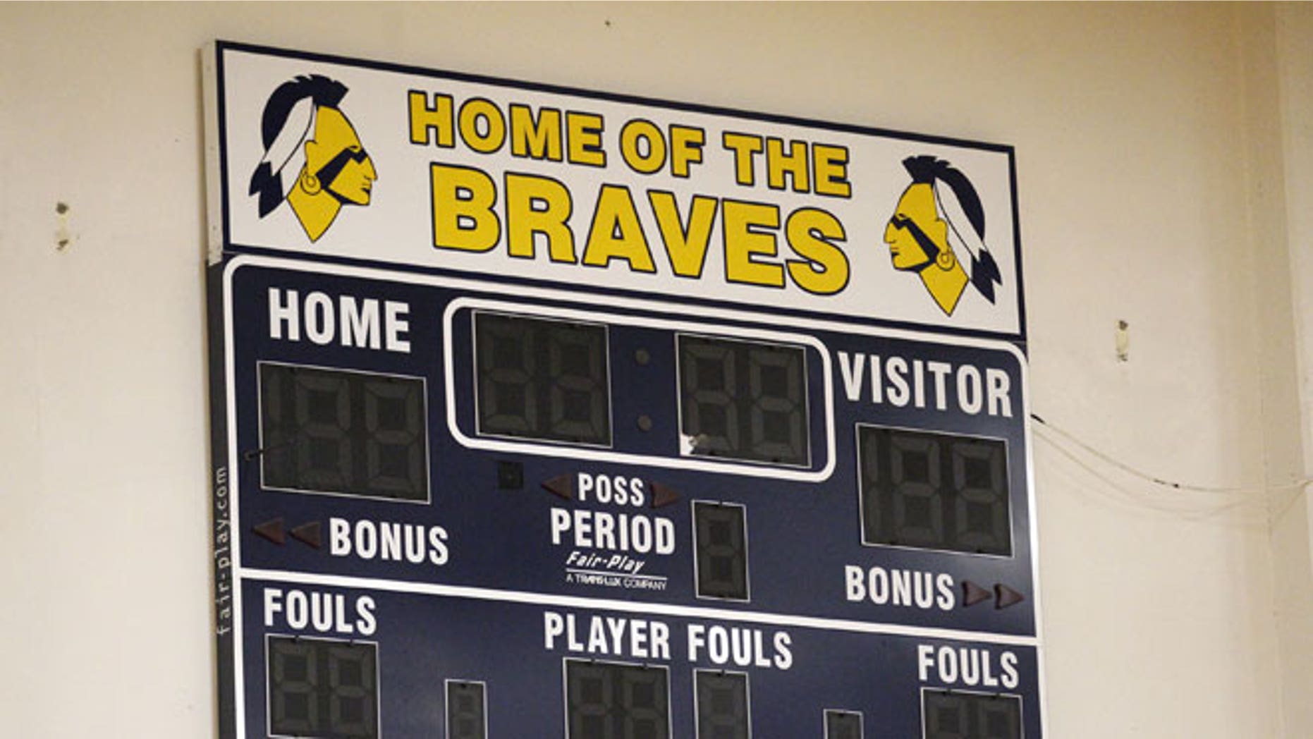 FILE: May 16, 2012: The Banks High School score board is shown on the wall of their gym in Banks, Oregon.