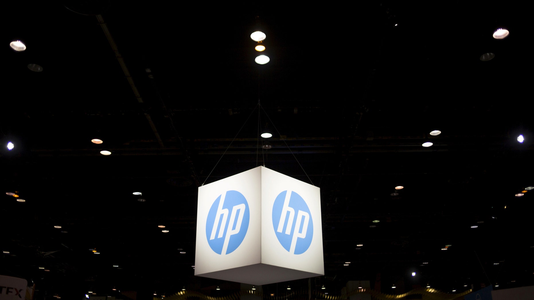 File photo: The Hewlett-Packard (HP) logo is seen as part of a display at the Microsoft Ignite technology conference in Chicago, Illinois, May 4, 2015. (REUTERS/Jim Young)