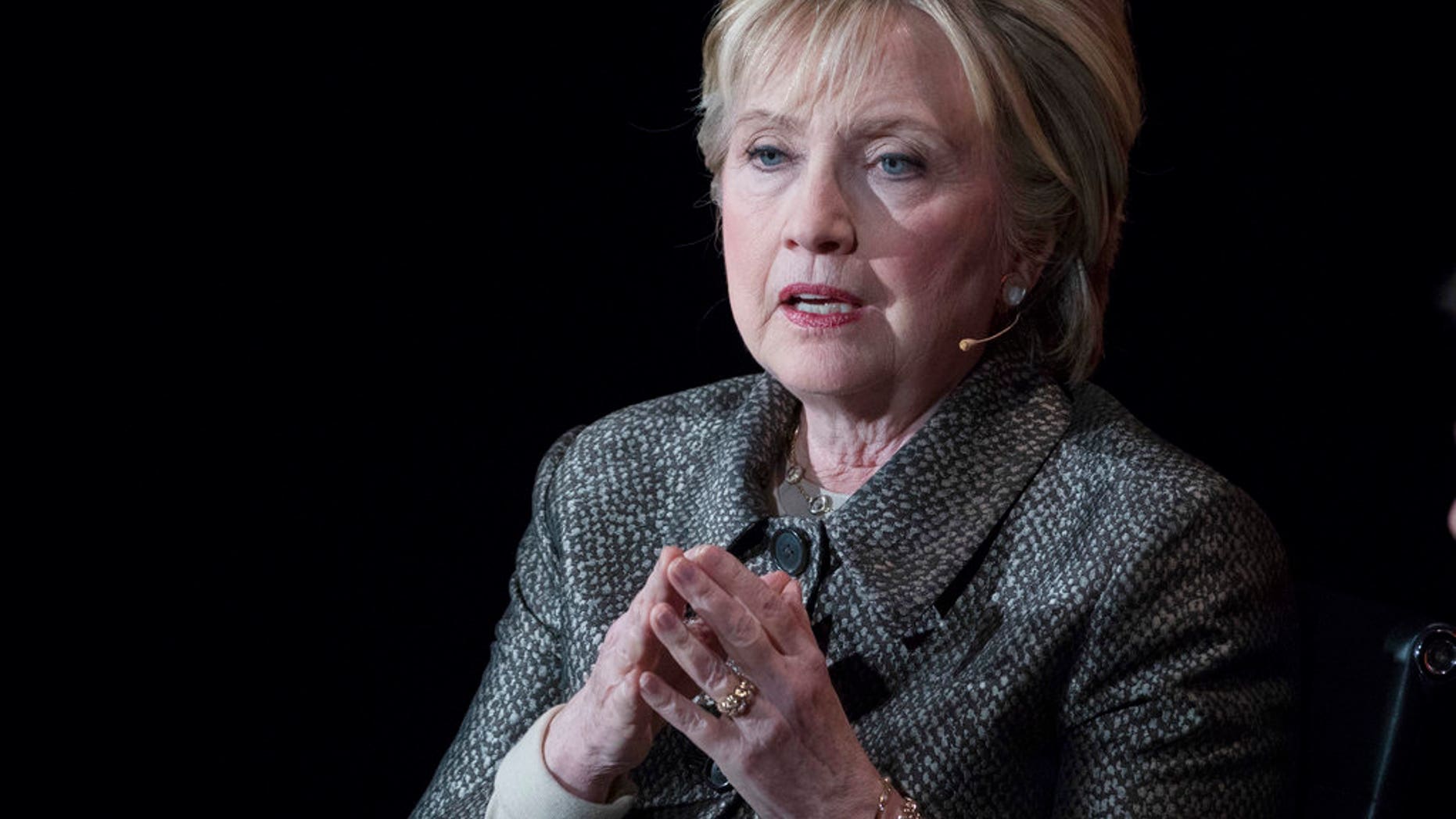 FILE - In this April 6, 2017, file photo, former Secretary of State Hillary Clinton speaks in New York. The Justice Departmentâs internal watchdog is expected to criticize the FBIâs handling of the Clinton email investigation, stepping into a political minefield as it details how a determinedly non-partisan law enforcement agency came to be entangled in the 2016 presidential race. President Donald Trump will look to the inspector general report to provide a fresh line of attack against the FBIâs two former top officials, Director James Comey and his deputy, Andrew McCabe, as he claims that a politically tainted bureau tried to undermine his campaign and, through the Russia investigation, his presidency. (AP Photo/Mary Altaffer, File)