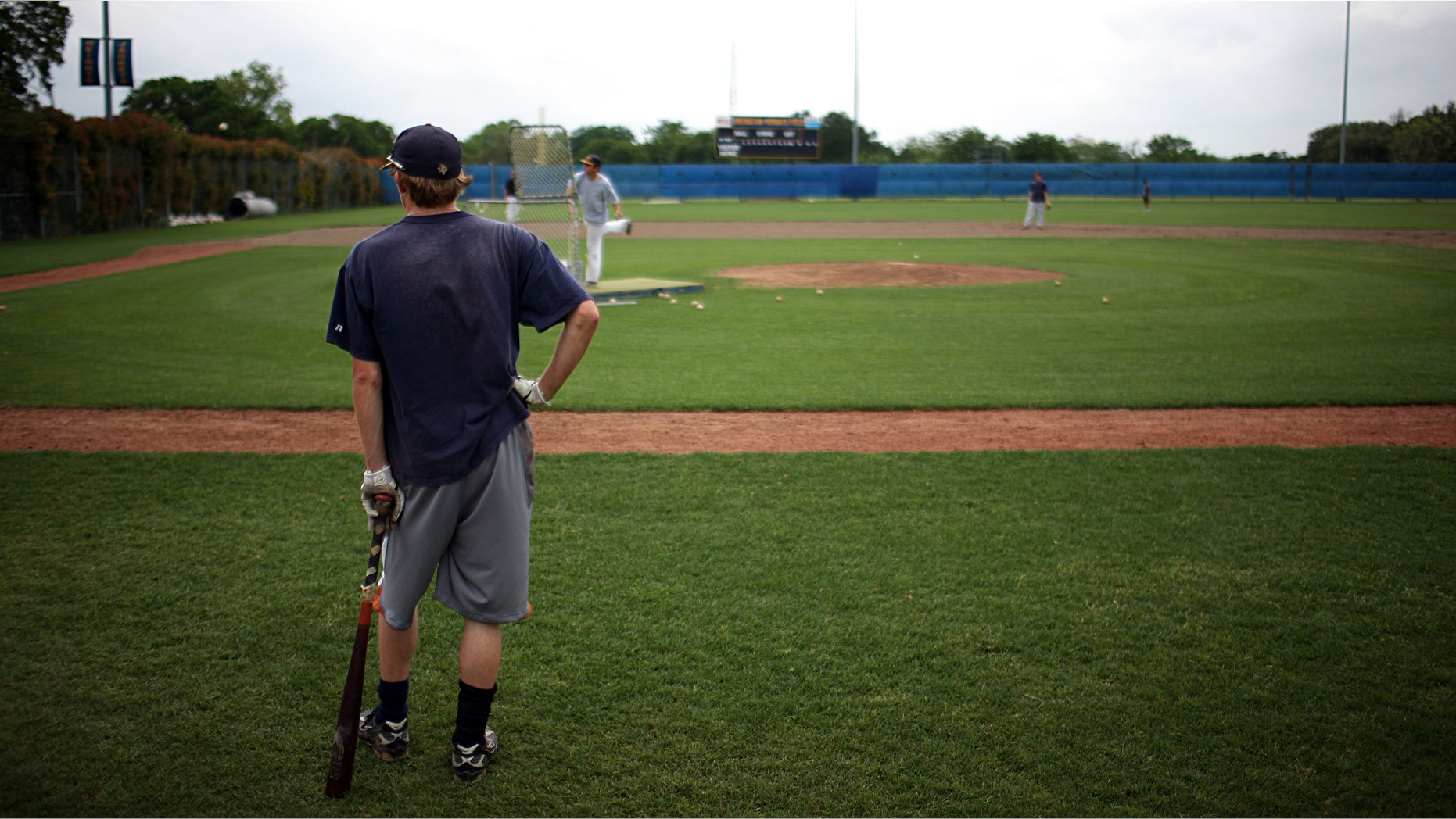FORT WORTH - APRIL 29: Members of the Arlington Heights High School baseball team participate in a voluntary practice after state University Interscholastic League officials announced a delay until May 11 for all Texas high school sport and academic events as a precaution against the swine flu April 29, 2009 in Fort Worth, Texas. Members of the baseball team were given the option to workout on their own after the day's practice was cancelled. (Photo by Tom Pennington/Getty Images)