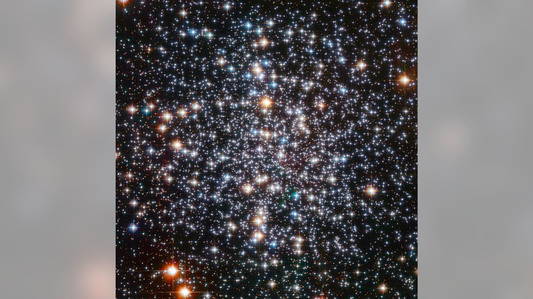 The many stars of the M4 globular cluster blaze like fireballs in this image snapped by the Hubble Space Telescope.