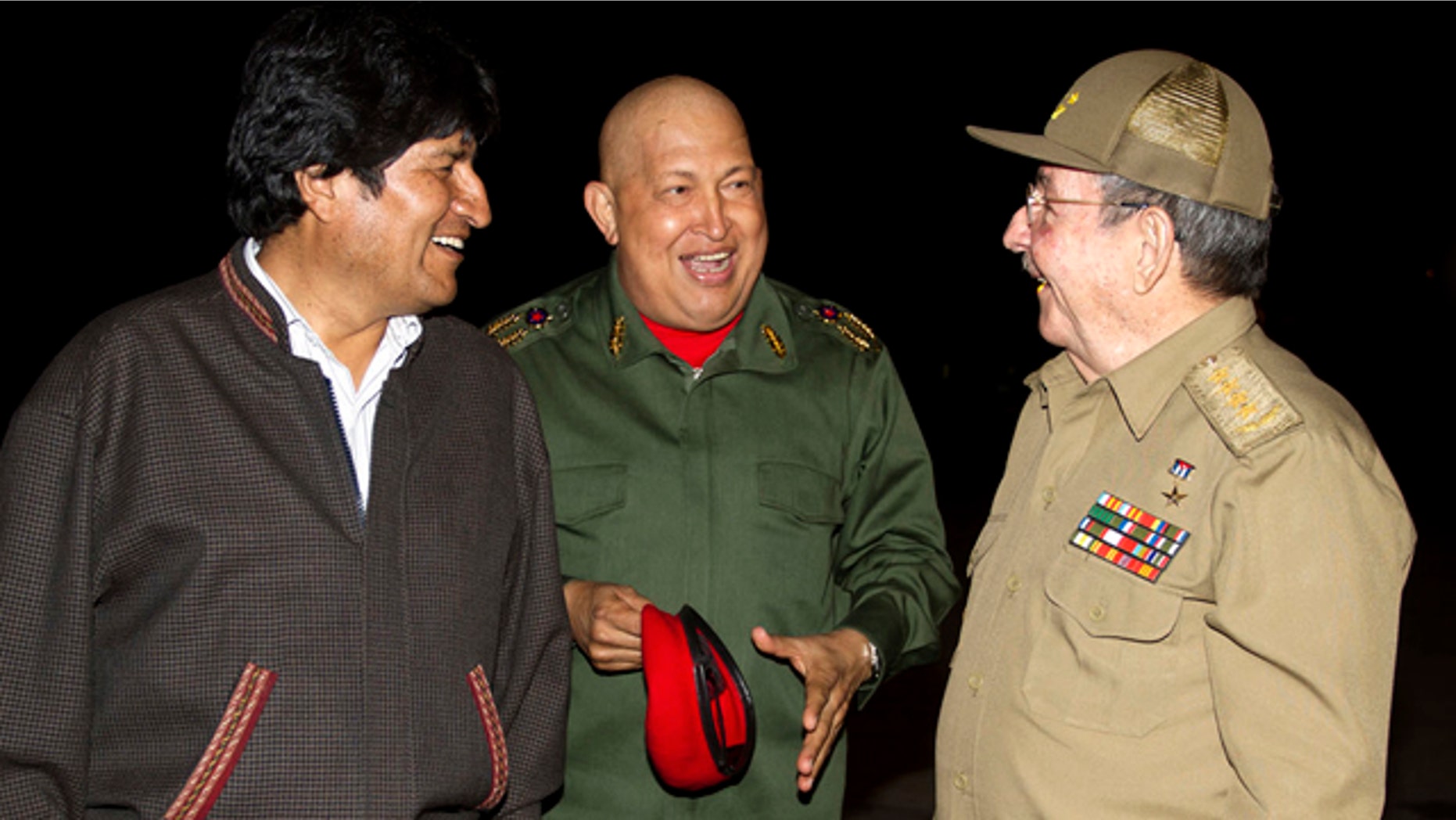 Sept. 18: Latin America leaders, from left, Bolivia's President Evo Morales, Venezuela's President Hugo Chavez and Cuba's President Raul Castro speak at the Jose Marti airport in Havana, Cuba