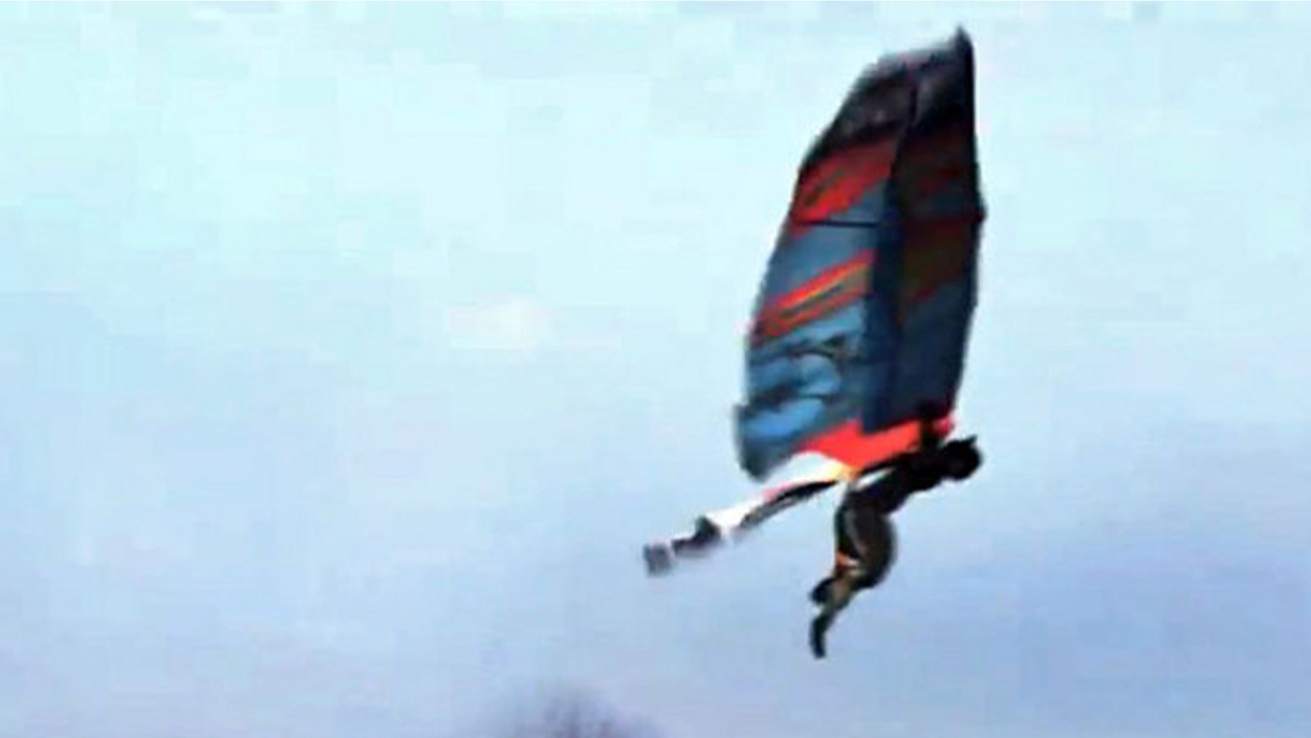 A video purportedly shows a man using homemade wings to soar like a bird. Experts suggest the video is a hoax, however -- a marketing campaign for Nintendo.