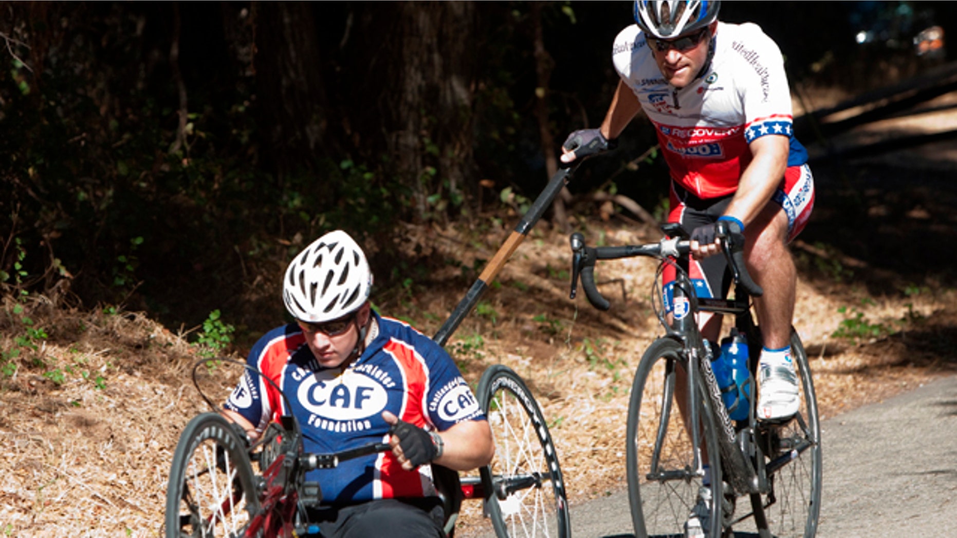 This handout photo, taken in October 2010, provided by Ride 2 Recovery, shows Clay Hunt, right, with Nate Hunt in the 2010 California Ride. Hunt epitomized a vibrant Iraq veteran that he represented one in a public service announcement that reminded veterans they weren't alone. On March 31, Hunt bolted himself in his Houston apartment and shot himself. (AP/Ride 2 Recovery)