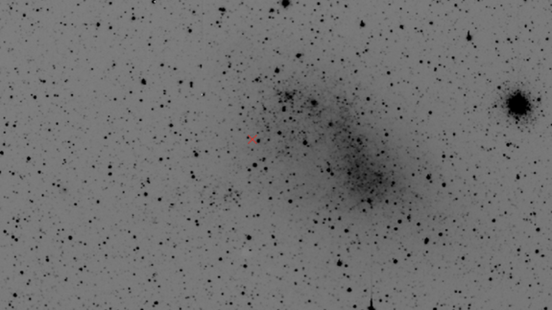 Image showing the location of the star HV 2112 — a hybrid between a red supergiant and a neutron star — in the Small Magellanic Cloud, a dwarf galaxy that lies about 200,000 light-years from Earth.