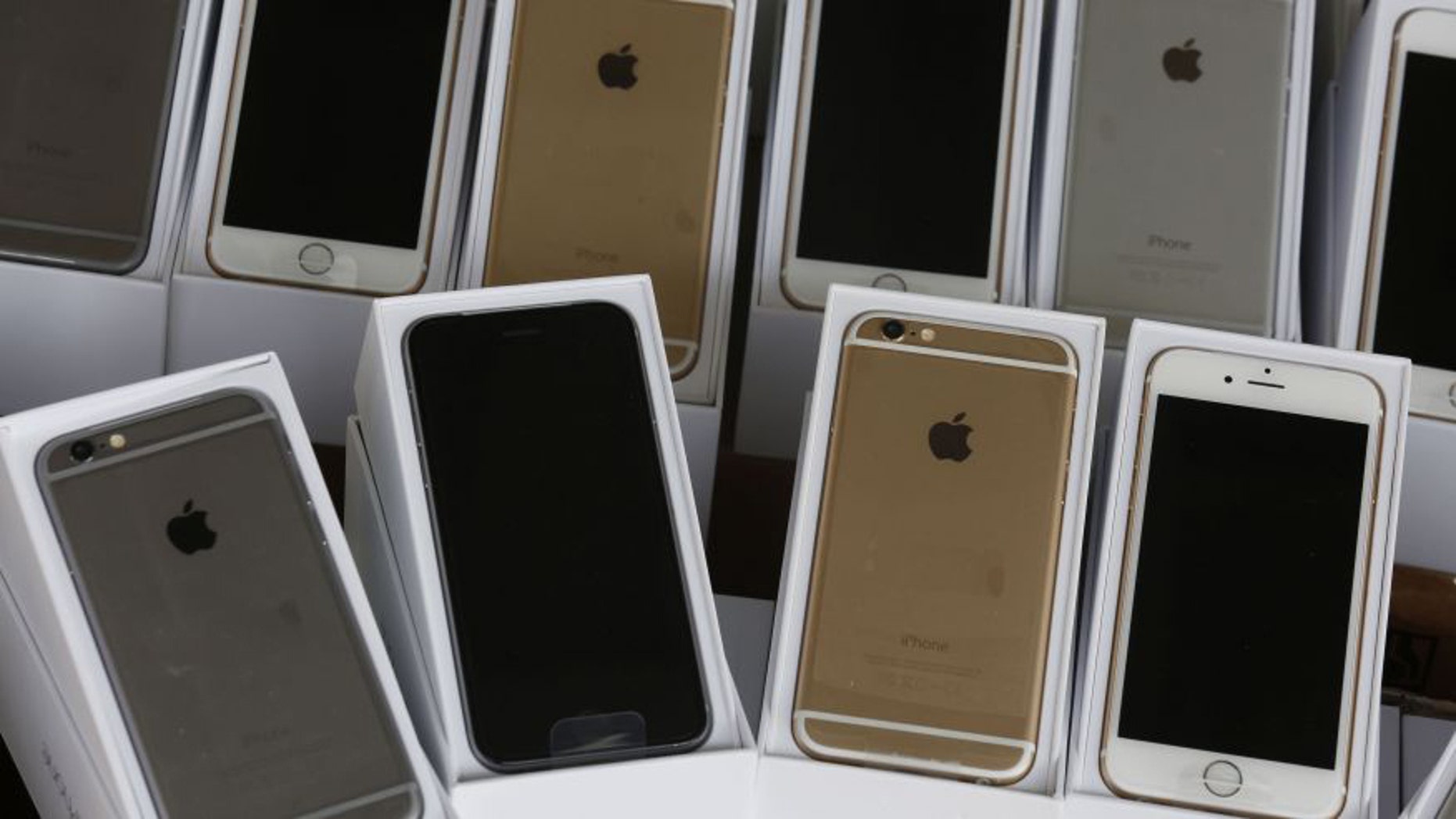 File photo - Apple's iPhone 6 are displayed during a news conference by Customs and Excise Department and the police in Hong Kong Sept. 21, 2014.
