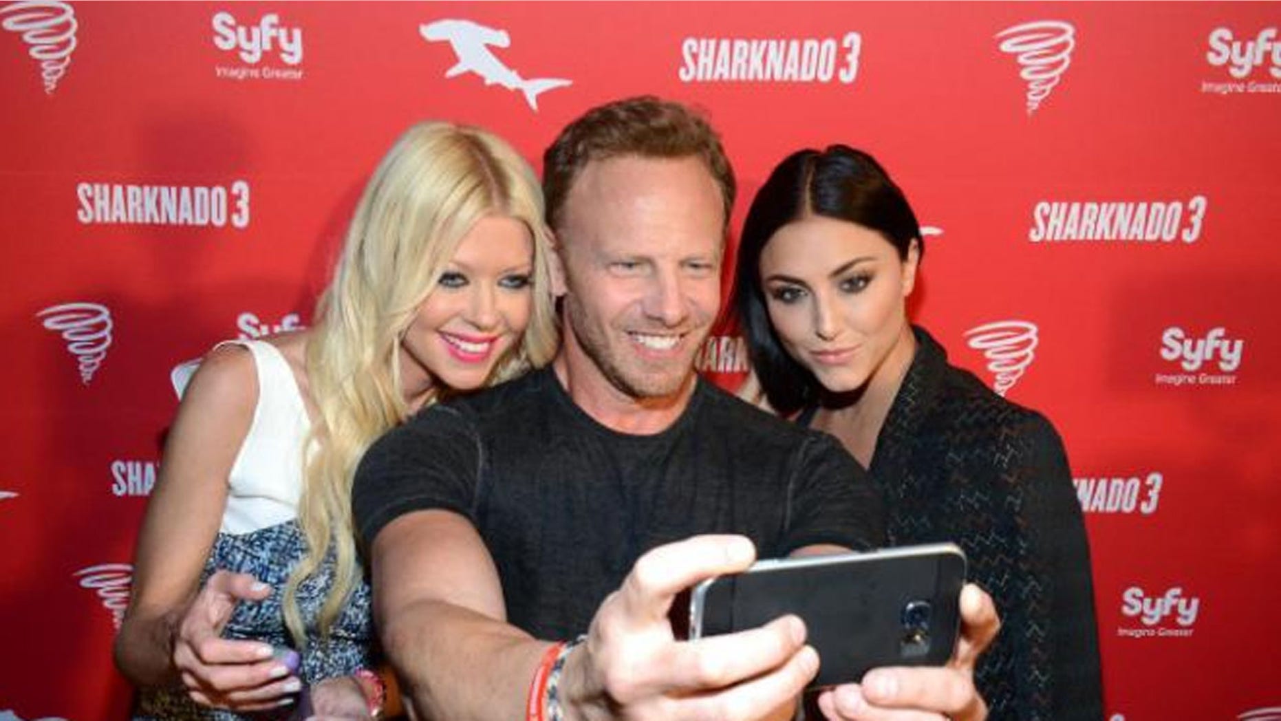 July 10, 2015: Ian Ziering (center), withTara Reid and Cassie Scerbo at Syfy’s Sharknado 3 Party at Hotel Solamar in San Diego, Calif.