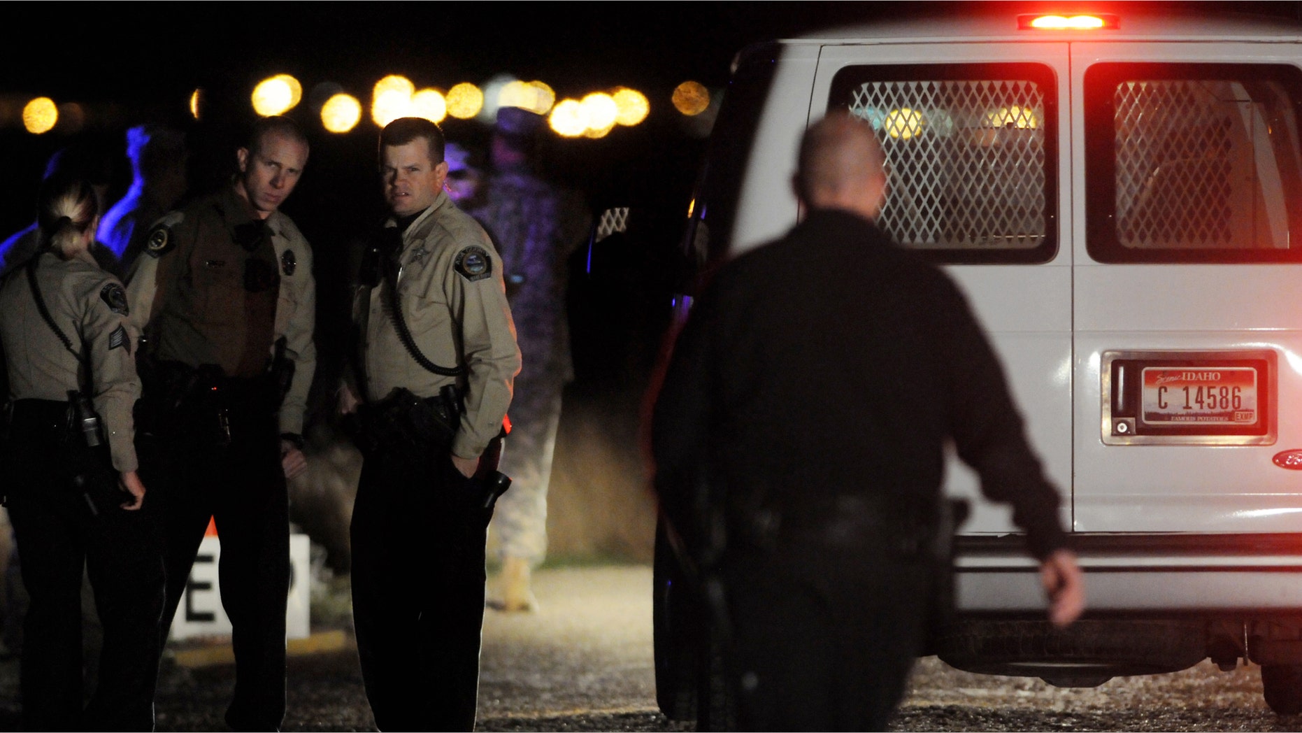 Nov. 7, 2014: A coroners van drives toward the crash site of an Apache helicopter that crashed south of the Boise Airport around 7 p.m. Thursday