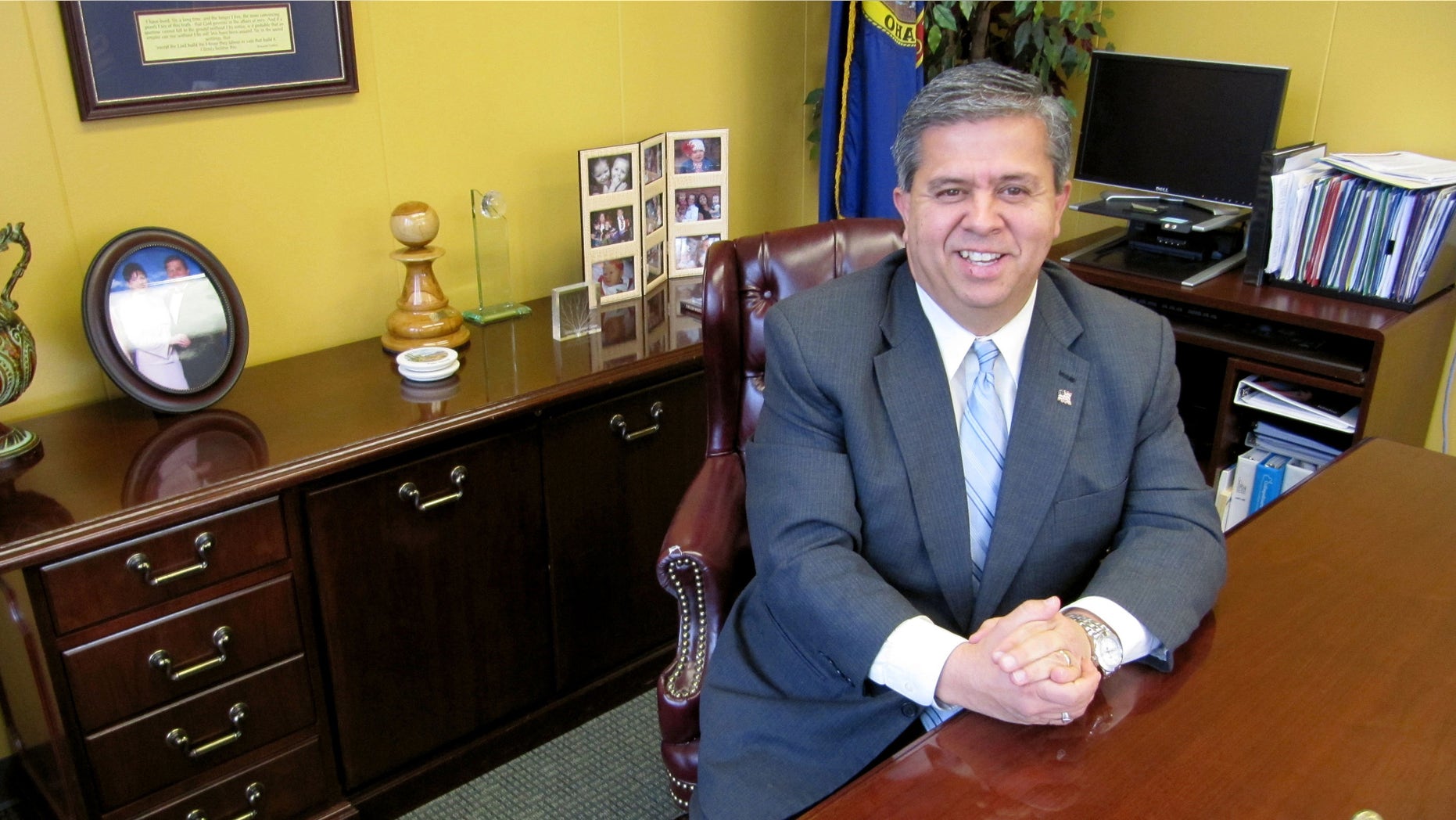 Feb. 9, 2010: FILE - In this file photo, Idaho Superintendent of Public Instruction Tom Luna poses for a photo at his office in Boise, Idaho. Parents across Idaho will now play a role in whether or not their childs teacher gets a raise.