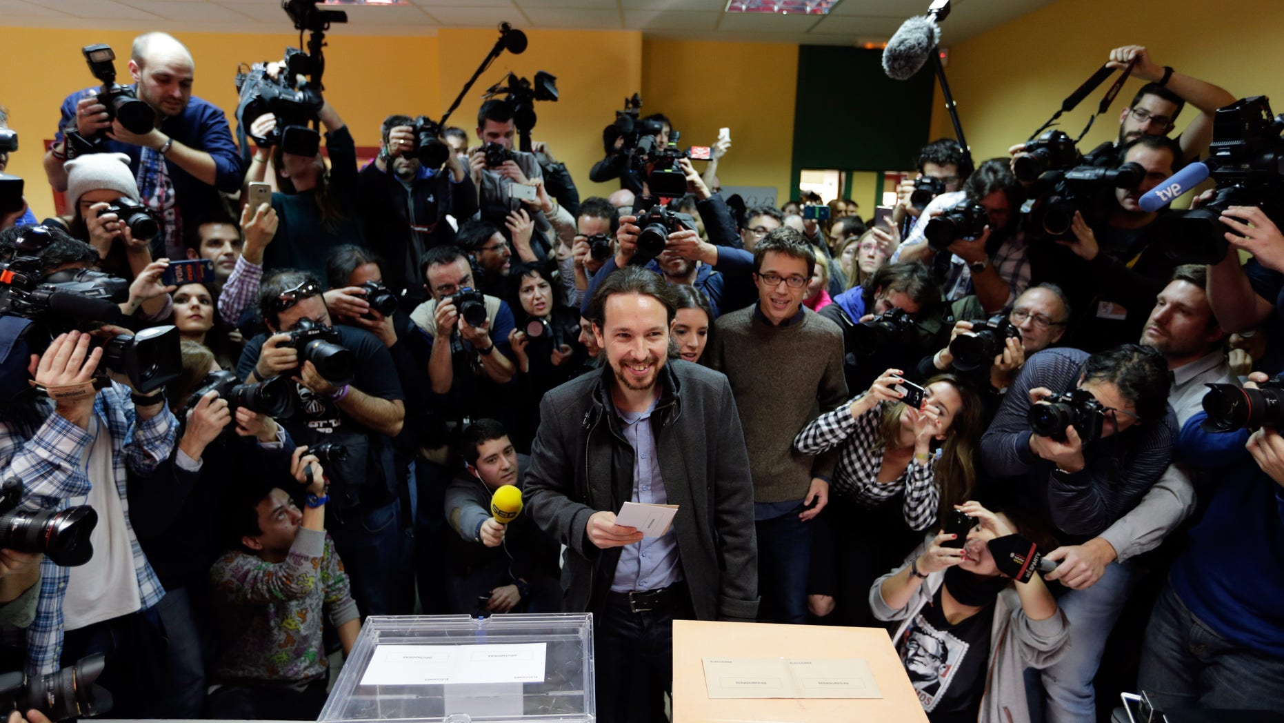 Pablo Iglesias, leader of Podemos party, casts his vote in Madrid, Sunday, Dec. 20, 2015.