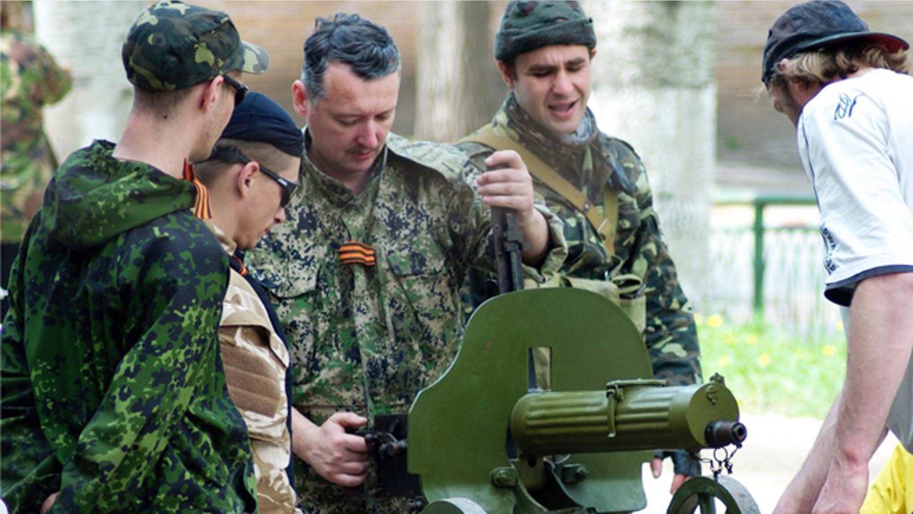 April 23, 2014: Igor Strelkov, the defense minister of the self-proclaimed "Donetsk People's Republic," inspects a World War I-era machine gun looted from a local museum.