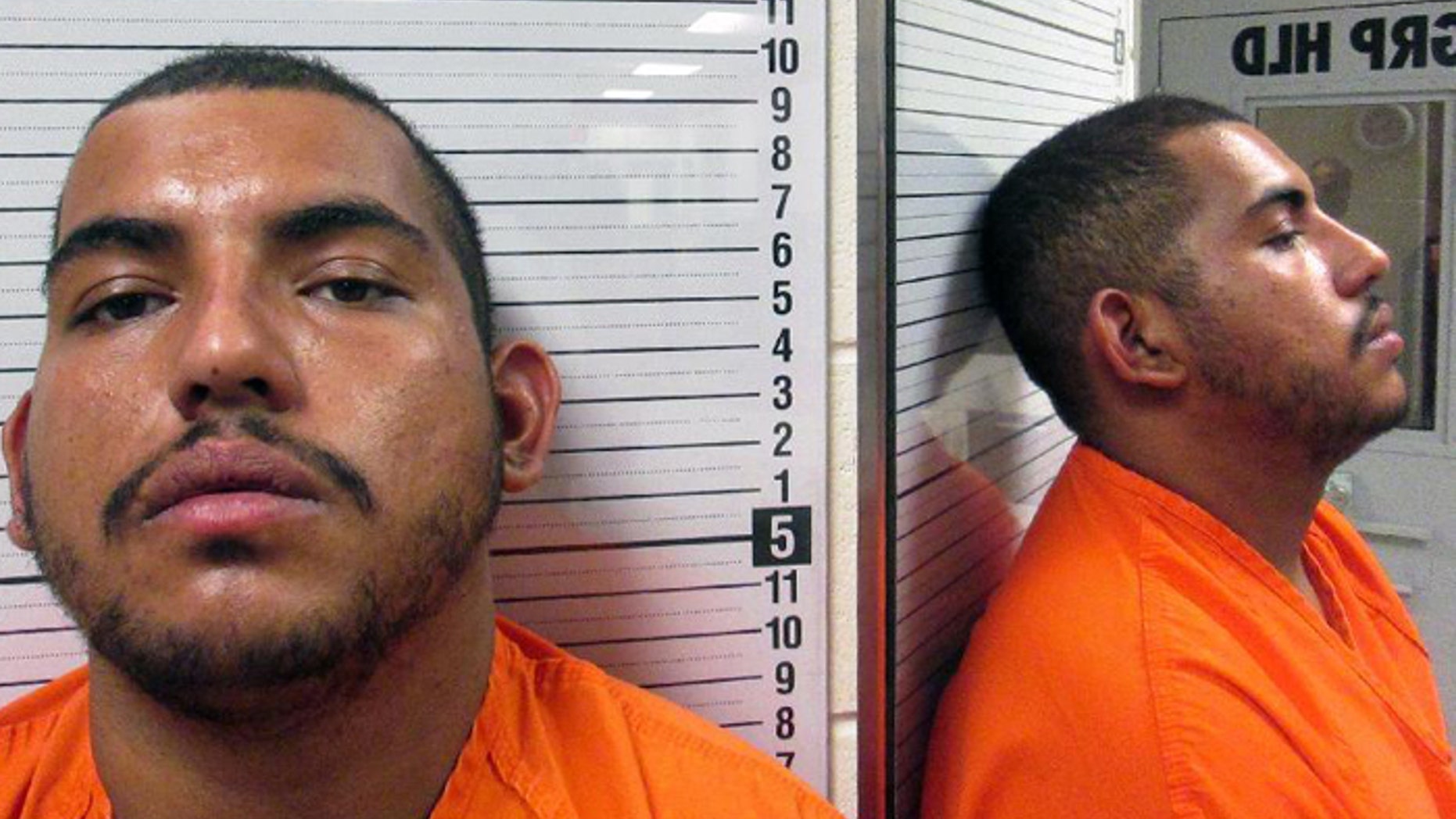Undated booking photo provided by the Park County, Wyo., Sheriff's Office shows Jesus Deniz Mendoza (A.K.A Jesus Deniz), who is suspected of shooting a family in Montana.