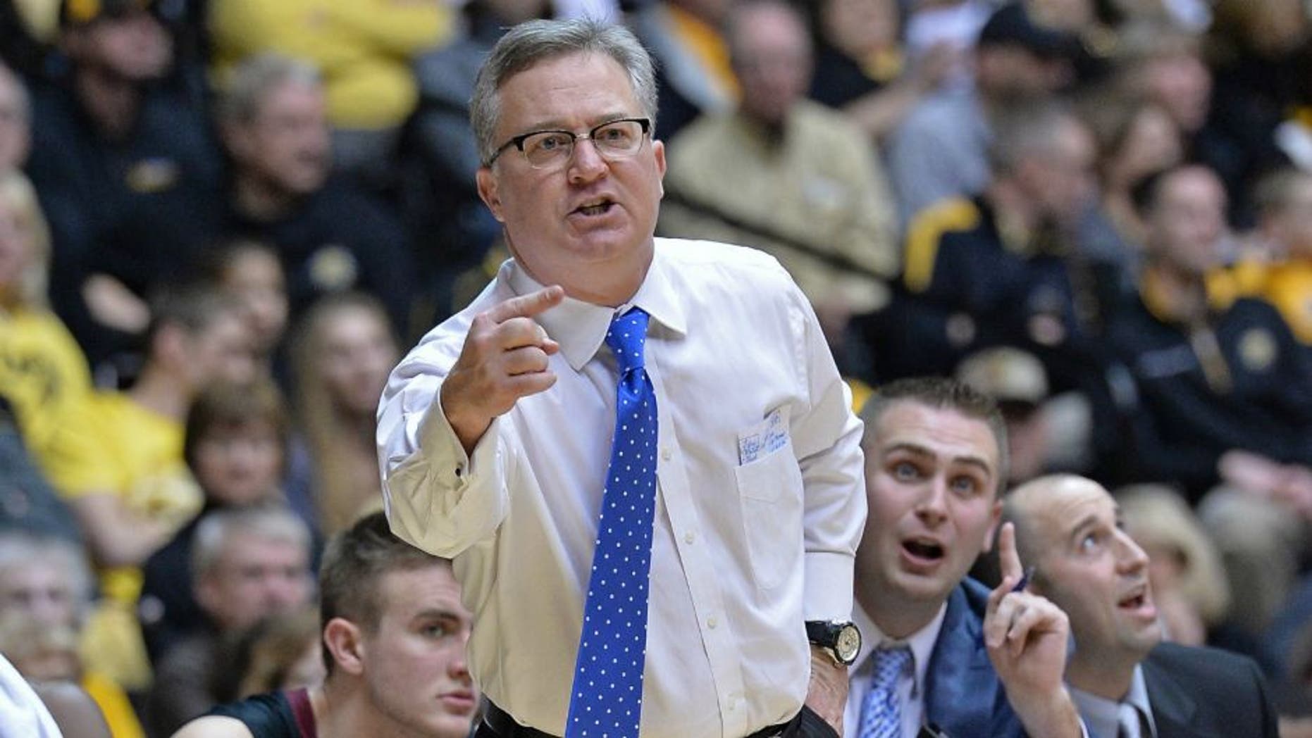 WICHITA, KS - FEBRUARY 11: Head coach Barry Hinson of the Southern Illinois Salukis calls out instructions against the Wichita State Shockers during the first half on February 11, 2014 at Charles Koch Arena in Wichita, Kansas. Wichita State won 78-67. (Photo by Peter Aiken/Getty Images)