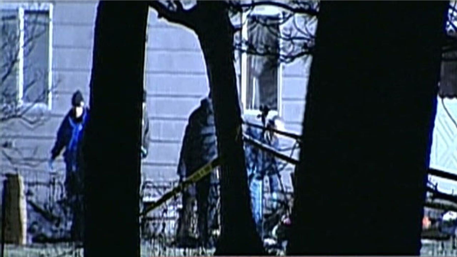 Dec. 17, 2011: Police investigate a crime scene in Illinois where five people were found shot to death.