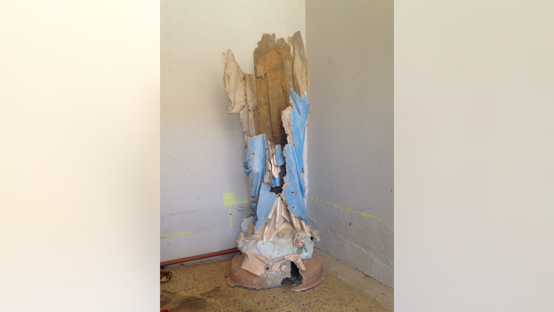 Statue of Mary used as target practice, Batnaya, Nineveh Plain, Iraq.