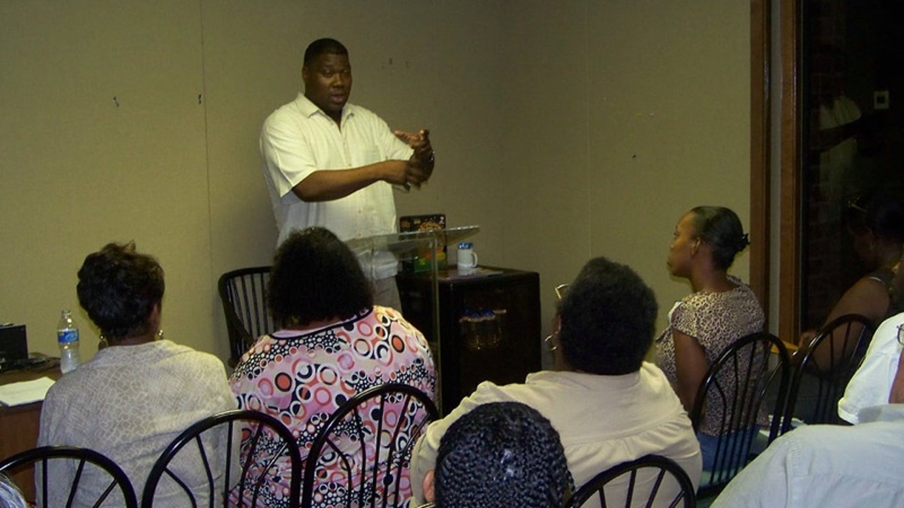 'Trump for Urban Communities' leader Bruce Carter speaks to activists at a meeting.