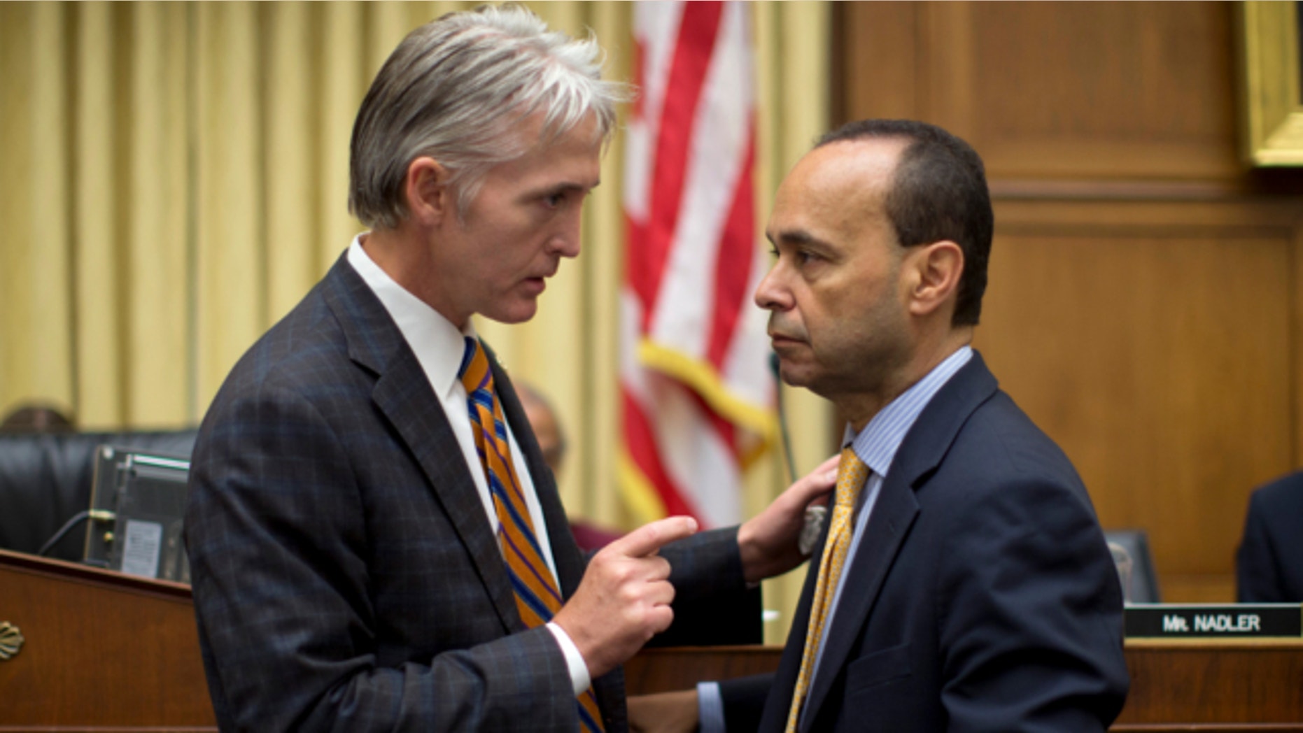 June 18, 2013: House Judiciary Committee member Rep. Trey Gowdy, R-S.C., sponsor of the Strengthen and Fortify Enforcement Act, left, talks with Rep. Luis Gutierrez, D-Ill., on Capitol Hill in Washington.