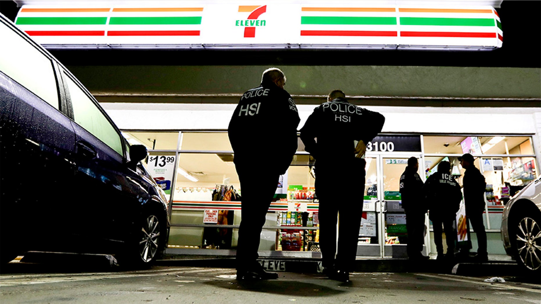 U.S. Immigration and Customs Enforcement agents aid they targeted about 100 7-Eleven stores nationwide Wednesday to open employment audits and interview workers.