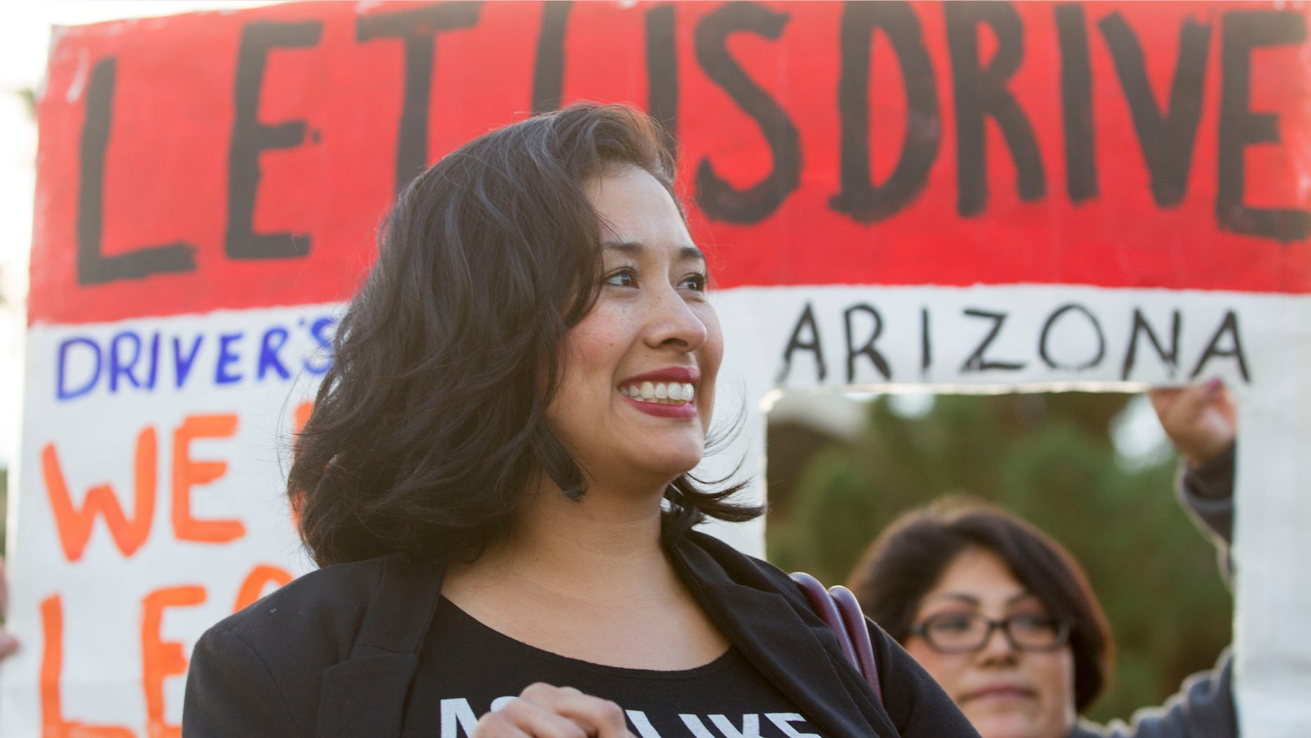 Dec. 17, 2014: Dulce Matuz celebrates at the Arizona State Capitol.