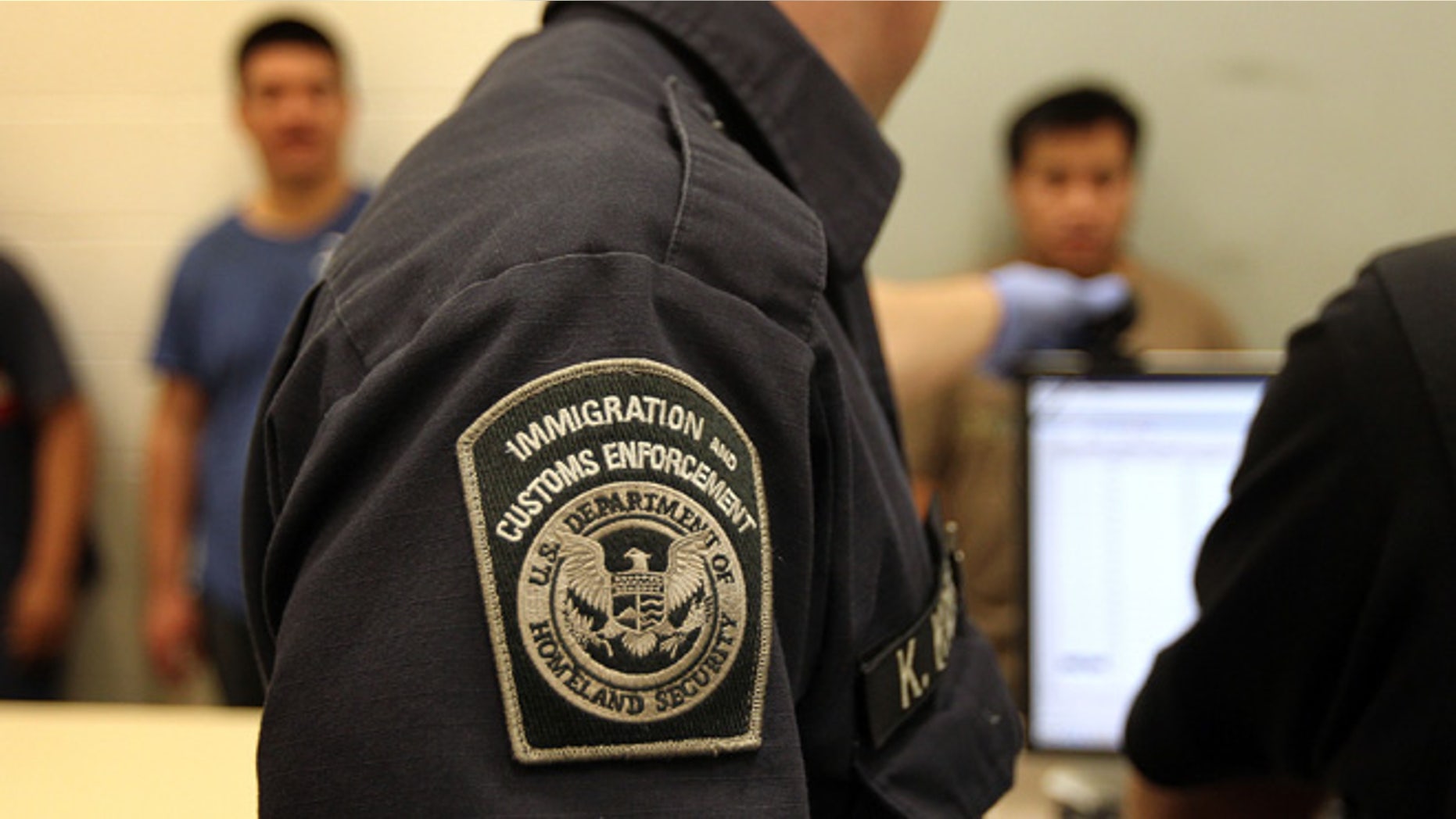 PHOENIX - APRIL 28: Undocumented Mexican immigrants are photographed while being in-processed at the Immigration and Customs Enforcement (ICE), center on April 28, 2010 in Phoenix, Arizona. Across Arizona, city police and county sheriffs' departments turn over detained immigrants to ICE, which deports them to their home countries. Last year ICE deported some 81,000 illegal immigrants from the state of Arizona alone, and with the passage of the state's new tough immigration enforcement law, the number of deportations could rise significantly. (Photo by John Moore/Getty Images)
