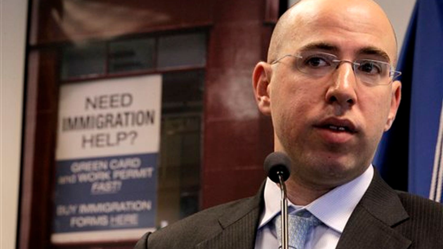 Zach Intrater, Assistant United States Attorney for the District of New Jersey, talks about the dangers of immigration scams during an awareness campaign that kicked off with a panel, Thursday, Dec. 1, 2011, in Newark, N.J. The campaign is aimed at educating legal and illegal immigrants to avoid everything from unlicensed service providers to websites that mimic those of government agencies. (AP Photo/Julio Cortez)