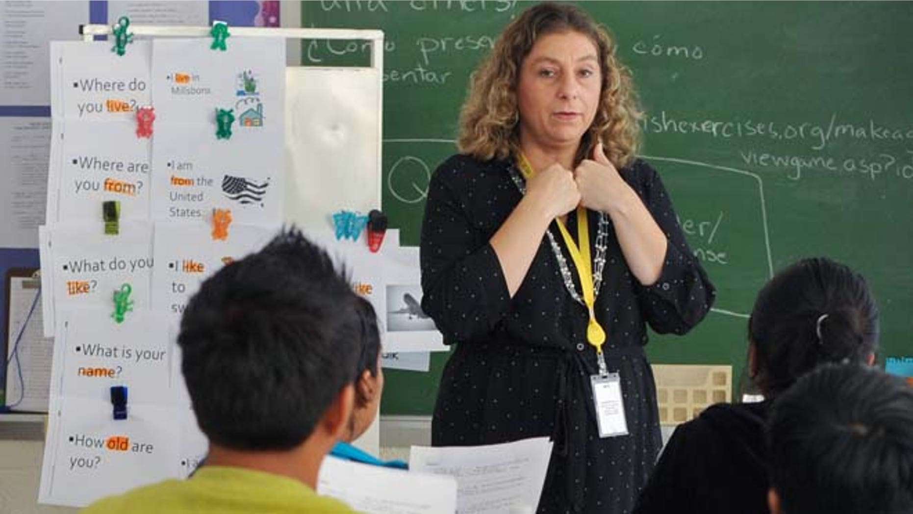 Sept. 11, 2014: In this photo, teacher Lori Ott, center, of Millsboro, Del., addresses students in the Accelerating Preliterate English Language Learners (A.P.E.L.L) class at the G.W. Career Educational Center in Frankford, Del.