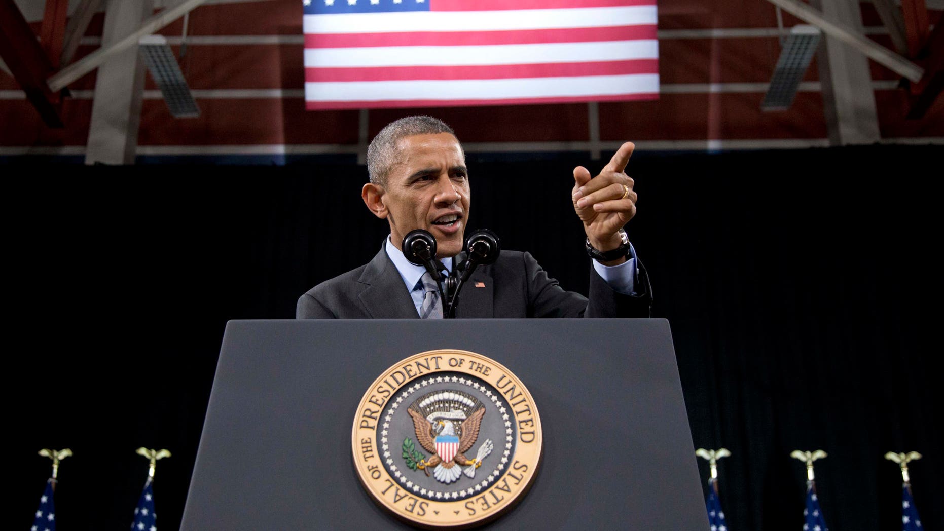 FILE - In this Nov. 21, 2014, file photo, U.S. President Barack Obama speaks about immigration at Del Sol High School in Las Vegas. Obama's plan to protect from deportation an estimated 5 million people living in the United States illegally suffered another setback Monday, Nov. 9, 2015, in a ruling from a New Orleans-based federal appeals court. In a 2-1 ruling, the 5th U.S. Circuit Court of Appeals upheld a Texas-based federal judge's injunction blocking the administration's immigration initiative. (AP Photo/Carolyn Kaster, File)