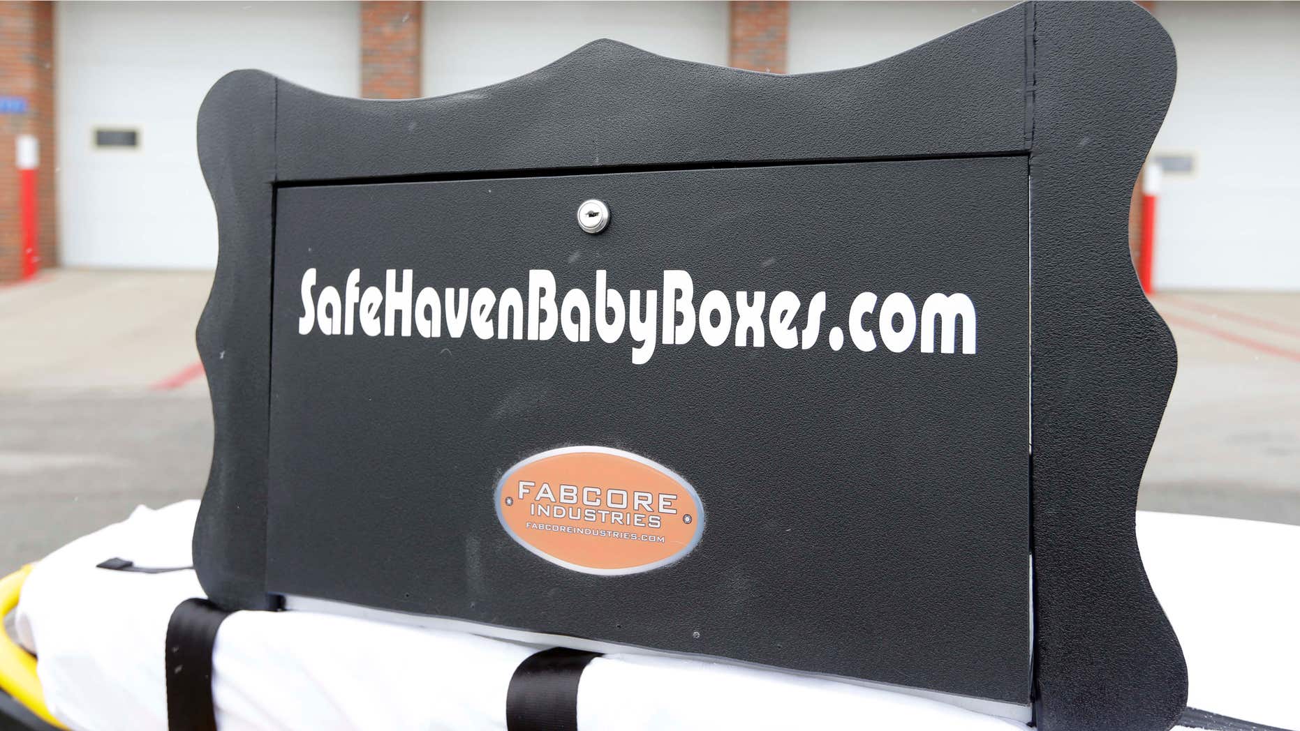 Feb. 26, 2015: A prototype of a baby box, where parents could surrender their newborns anonymously, is shown outside the fire station in Woodburn, Ind.