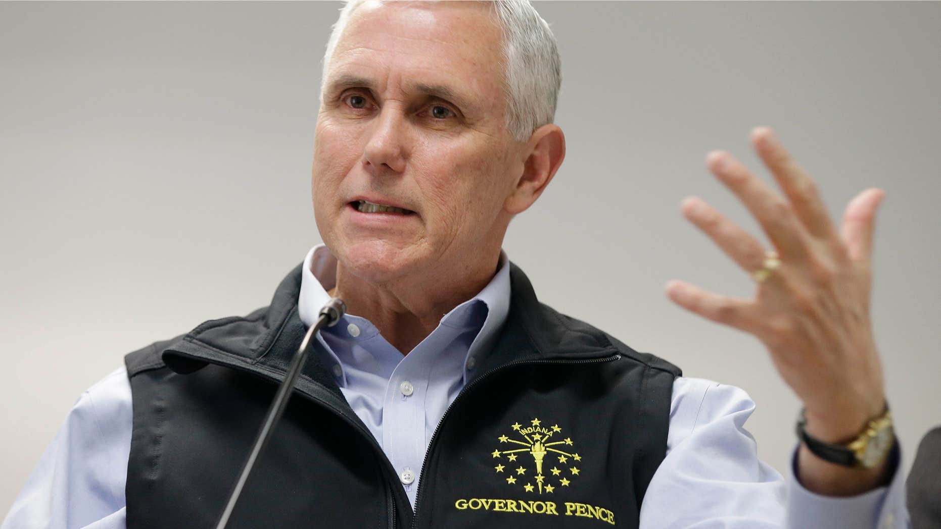 March 25, 2015: Indiana Gov. Mike Pence responds to a question during a news conference.
