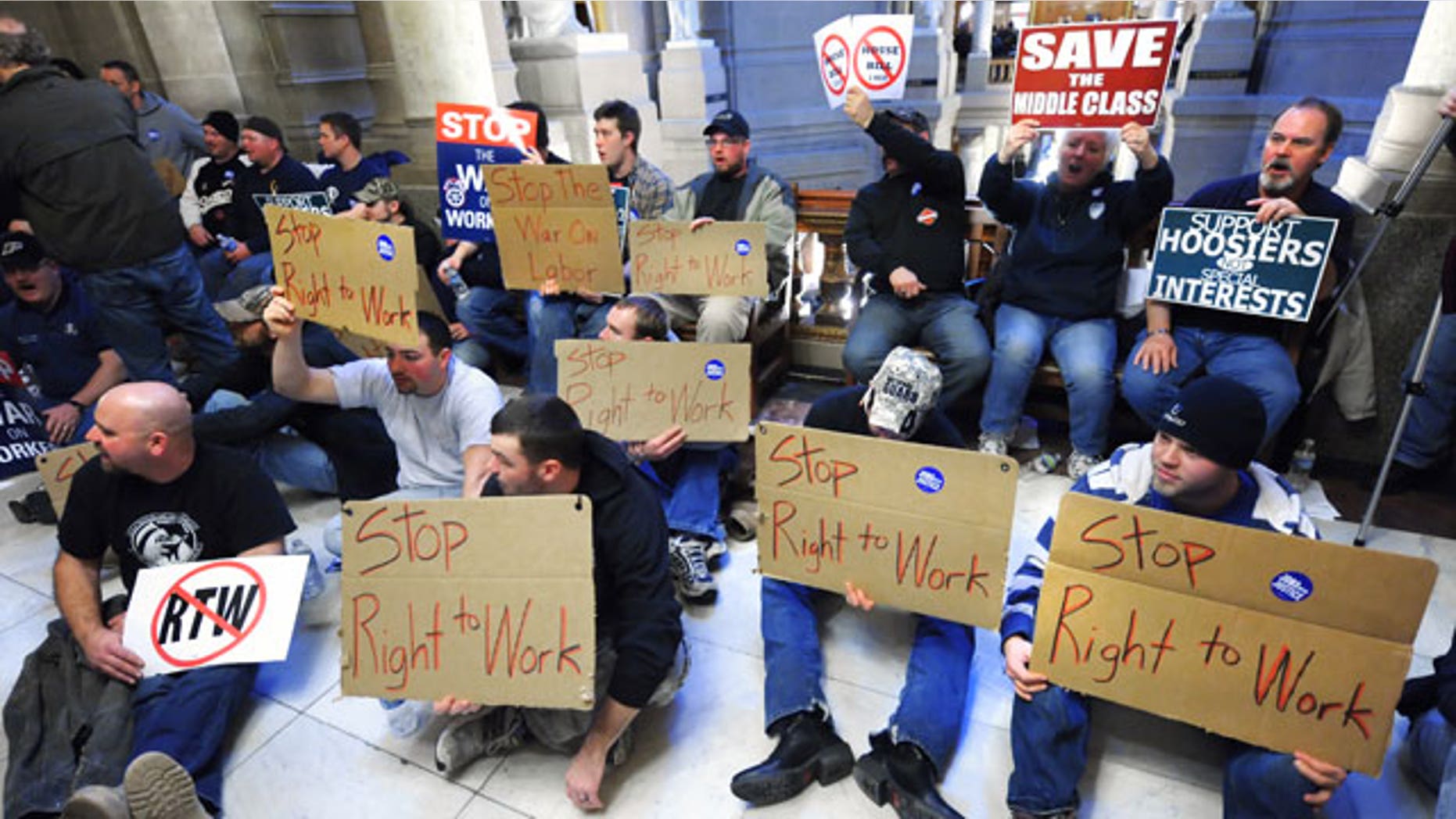 Union members from throughout Indiana protest several anti-labor bills outside the Senate chambers at the Indiana Statehouse, Tuesday, Feb. 22, 2011, in Indianapolis. (AP)