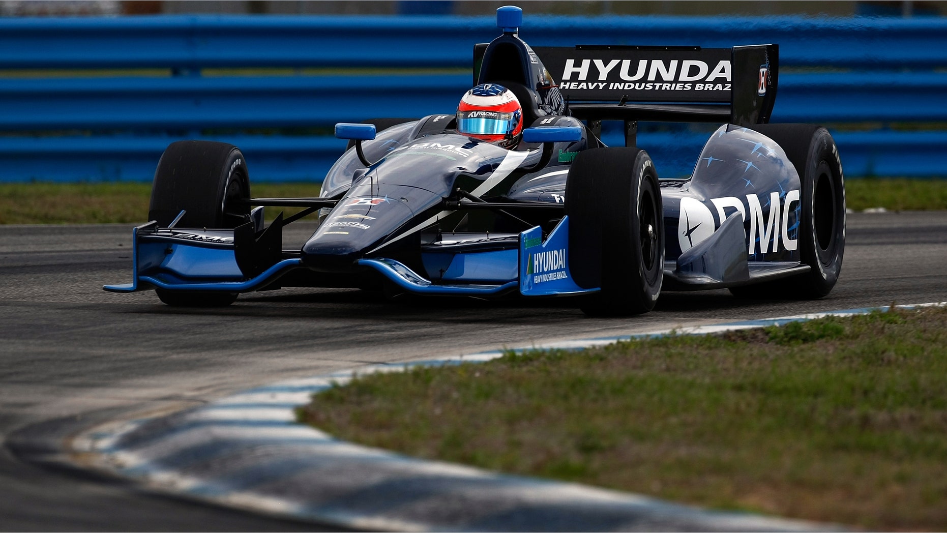 SEBRING, FL - MARCH 08: Rubens Barichello of Brazil drives his #8 BMC KV Racing Technolgy Chevy Dallara DW12 during the Sebring Open Test for the IZOD INDYCAR Series at Sebring International Raceway on March 8, 2012 in Sebring, Florida. (Photo by Jonathan Ferrey/Getty Images)