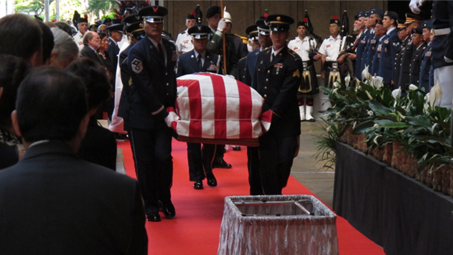 Dec. 22, 2012: Pallbearers carry the casket of U.S. Sen. Daniel Inouye into the courtyard of the Hawaii state Capitol during a visitation ceremony in Honolulu.