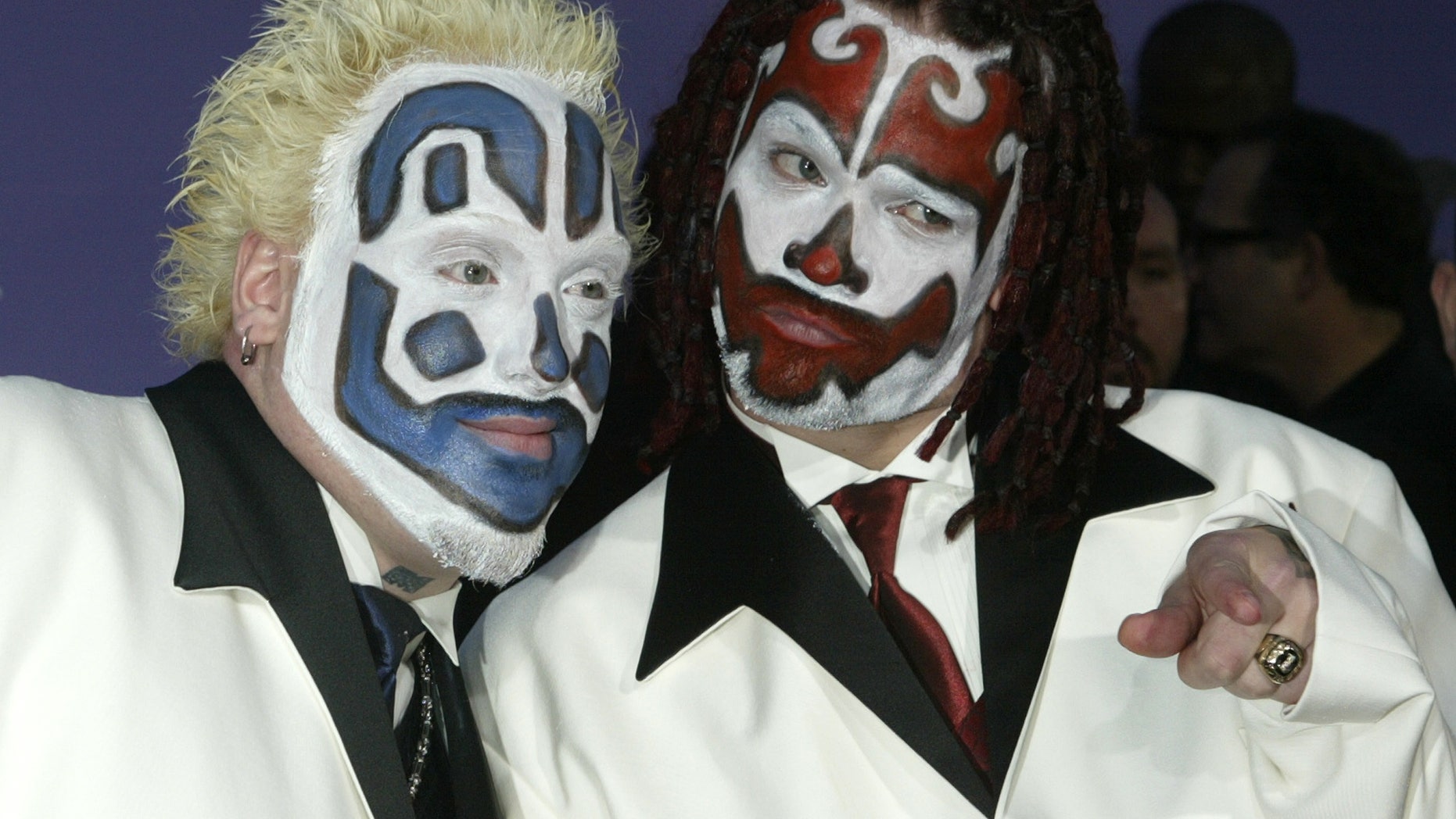 Members of the Insane Clown Posse pose as they arrive at the 2003 Billboard Music Awards at the MGM Grand Garden Arena in Las Vegas, Nevada, Dec. 10, 2003.