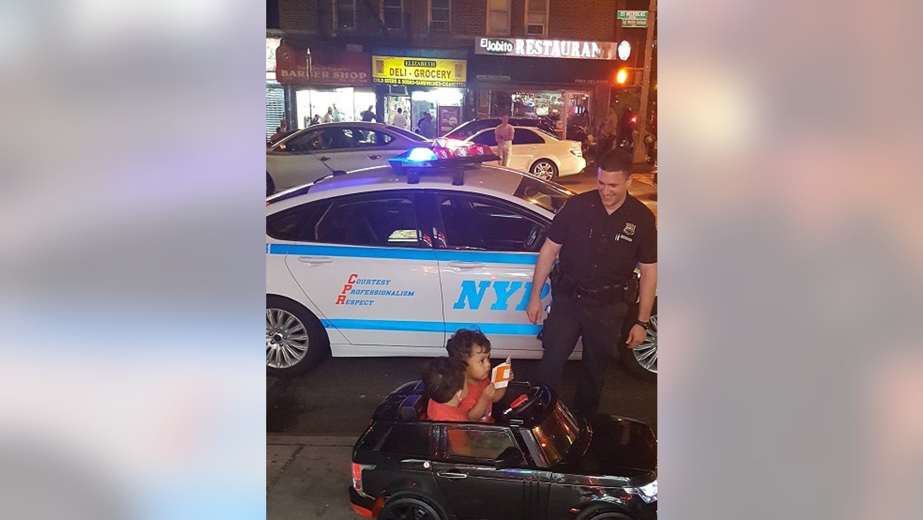 NYPD officer pulling over the twin boys.