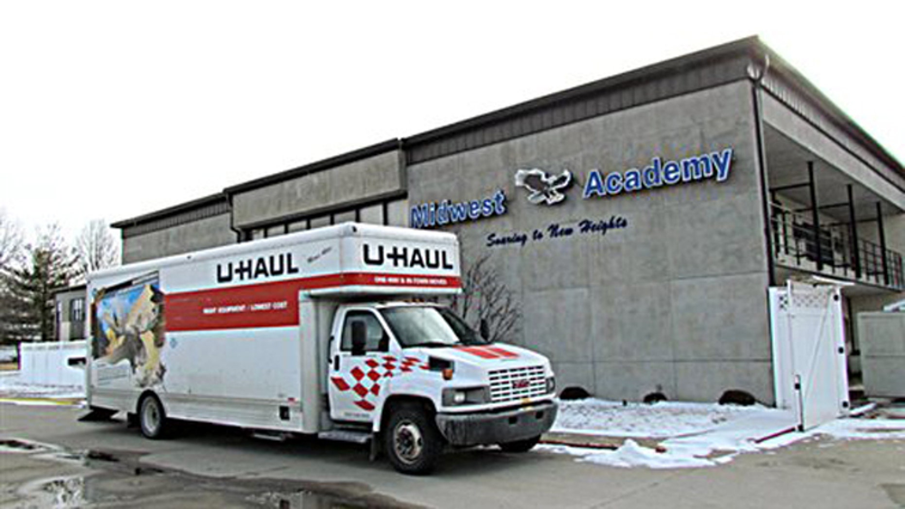 Photo taken Thursday, Feb. 11, 2016, shows a U-Haul outside Midwest Academy in Keokuk, Iowa. (Cindy Iutzi/Daily Gate City via AP)
