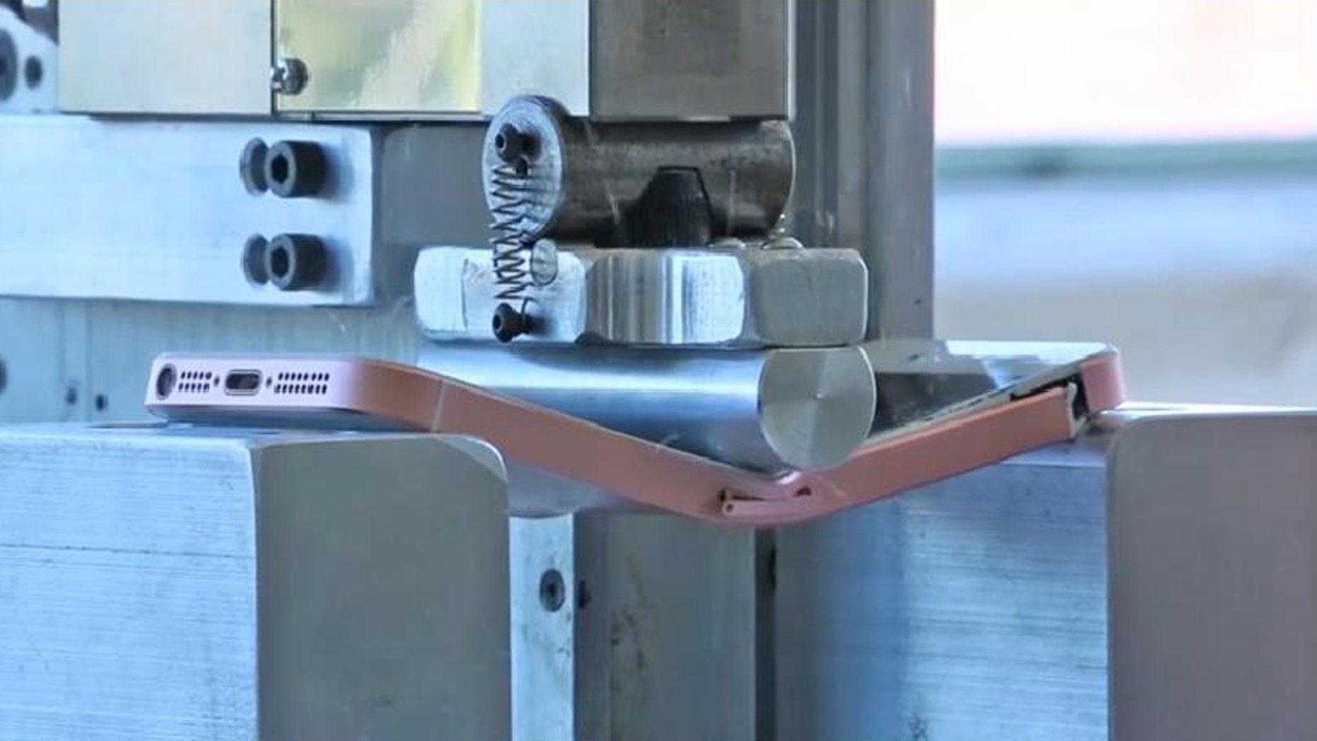 An iPhone SE undergoes testing by SquareTrade's BendBot (SquareTrade)