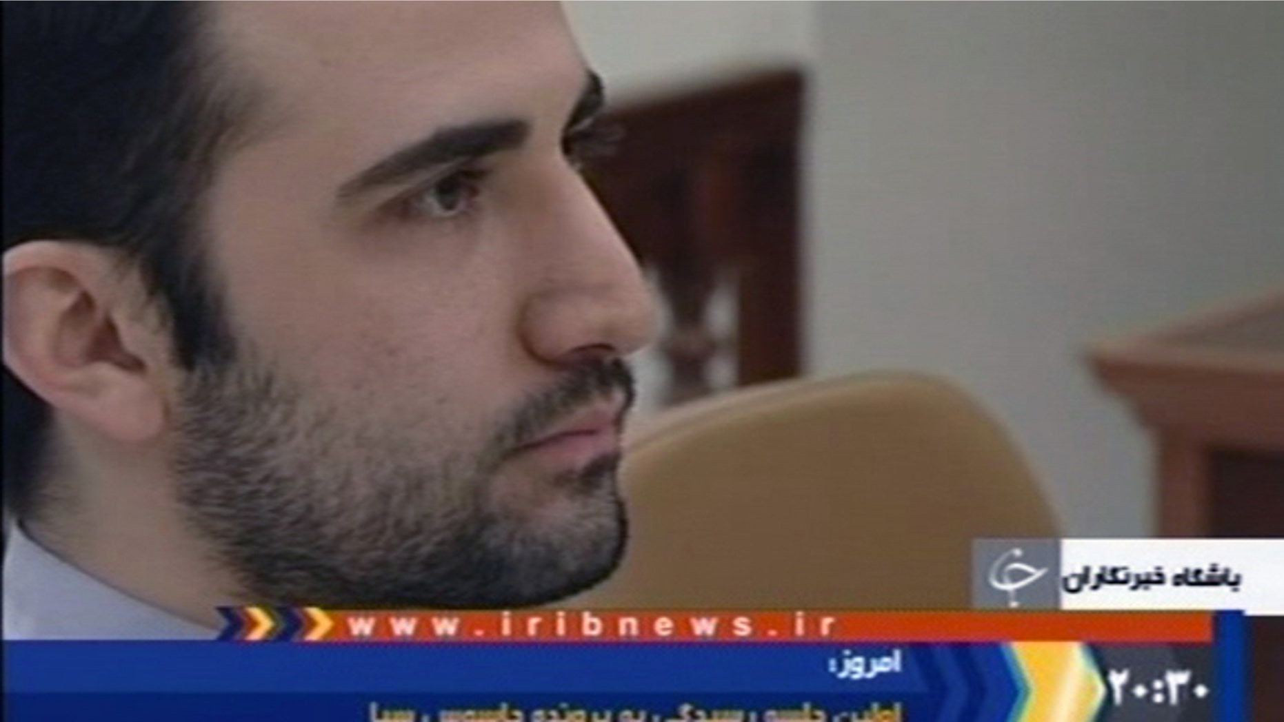 Dec. 27, 2011: In this video frame grab image made from the Iranian broadcaster IRIB TV, U.S. citizen Amir Mirzaei Hekmati, accused by Iran of spying for the CIA, sits in Tehran's revolutionary court in Iran.