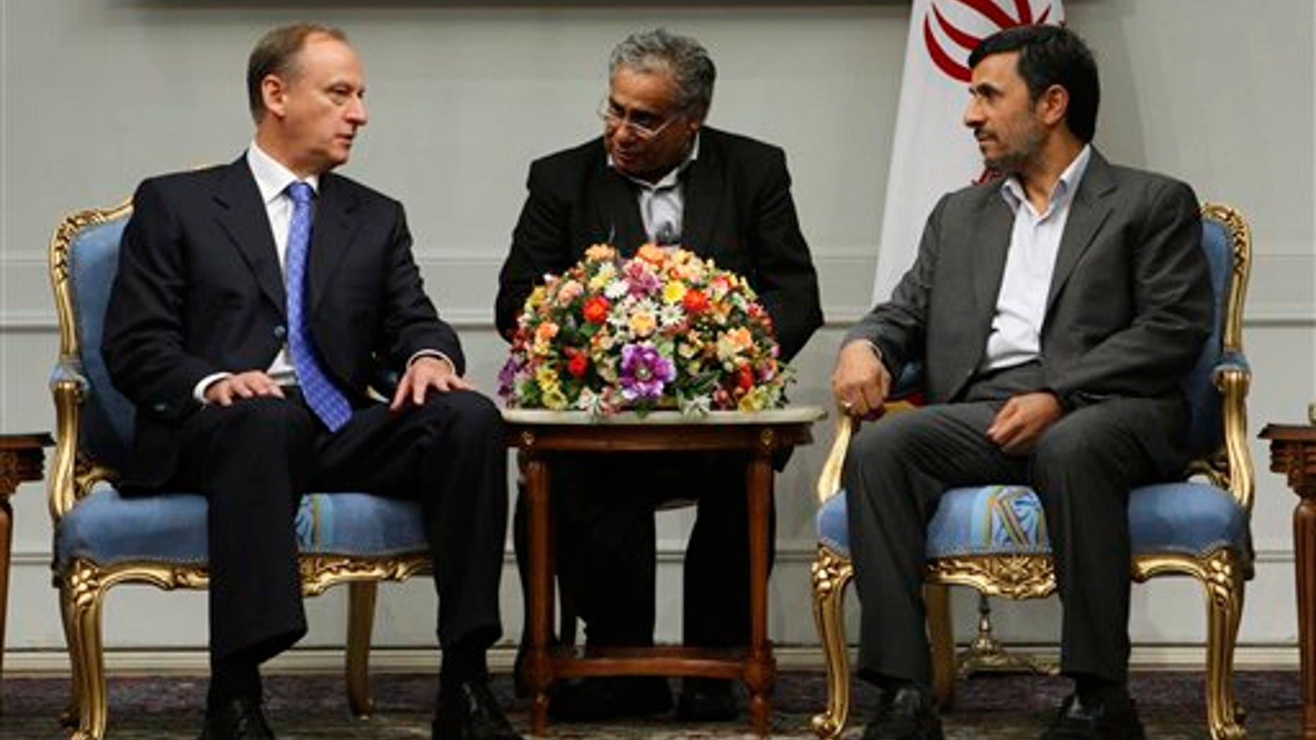 Aug. 16: Iranian President Mahmoud Ahmadinejad, right, meets with Russia's Security Council Secretary Nikolai Patrushev at the presidency office in Tehran, Iran. Iran's state news agency said Patrushev arrived Monday in Tehran to discuss a proposal to bring Iran back to negotiations over its disputed nuclear program.