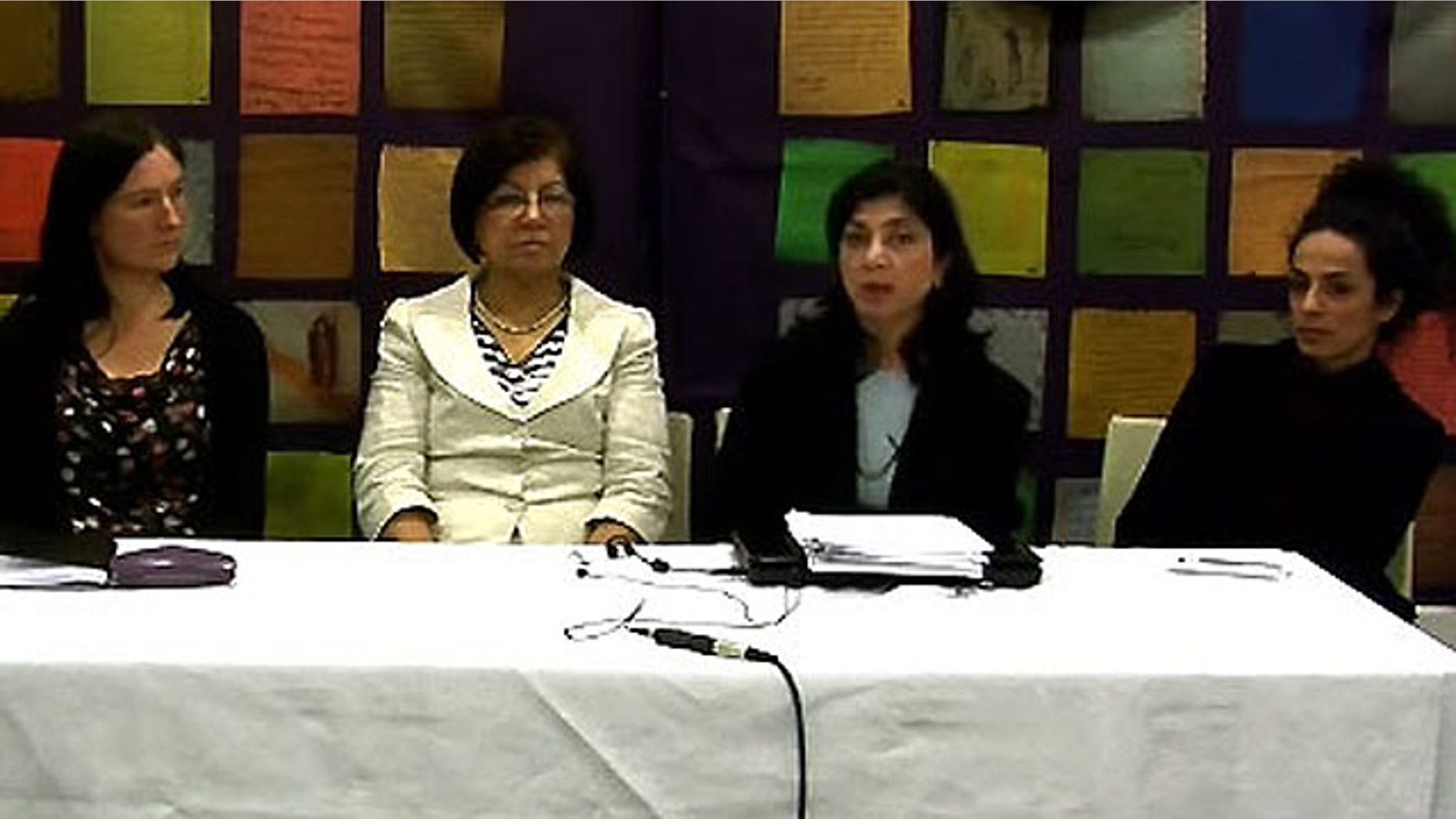 Panelists at last week's press conference discuss Iran's Family Protection Bill. From left: Ann Harrison, Amnesty International; Rouhi Shafii, International Coalition Against Violence in Iran; Roya Kashefi, Association des Chercheurs Iraniens; and journalist Masih Alinejad.