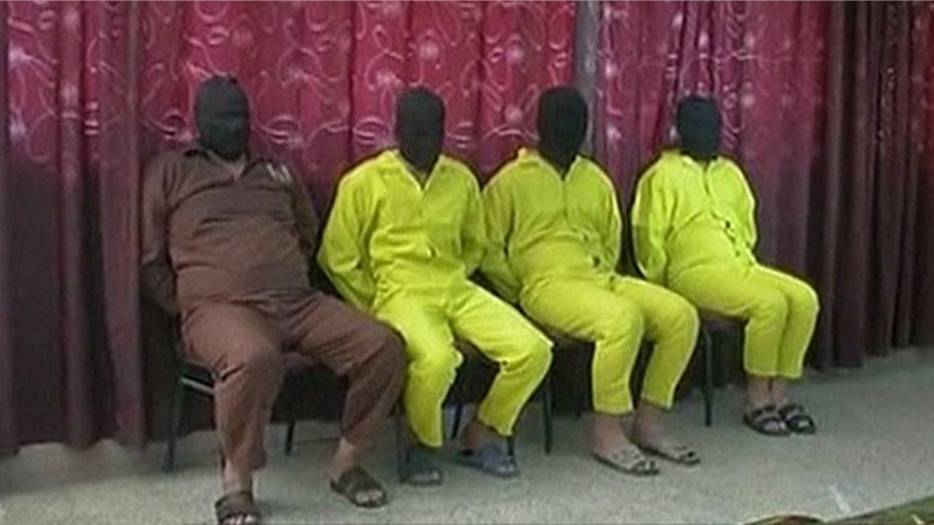 June 1, 2013: Four suspects believed to be involved in the chemical weapons plot are seen at a news conference in Iraq.