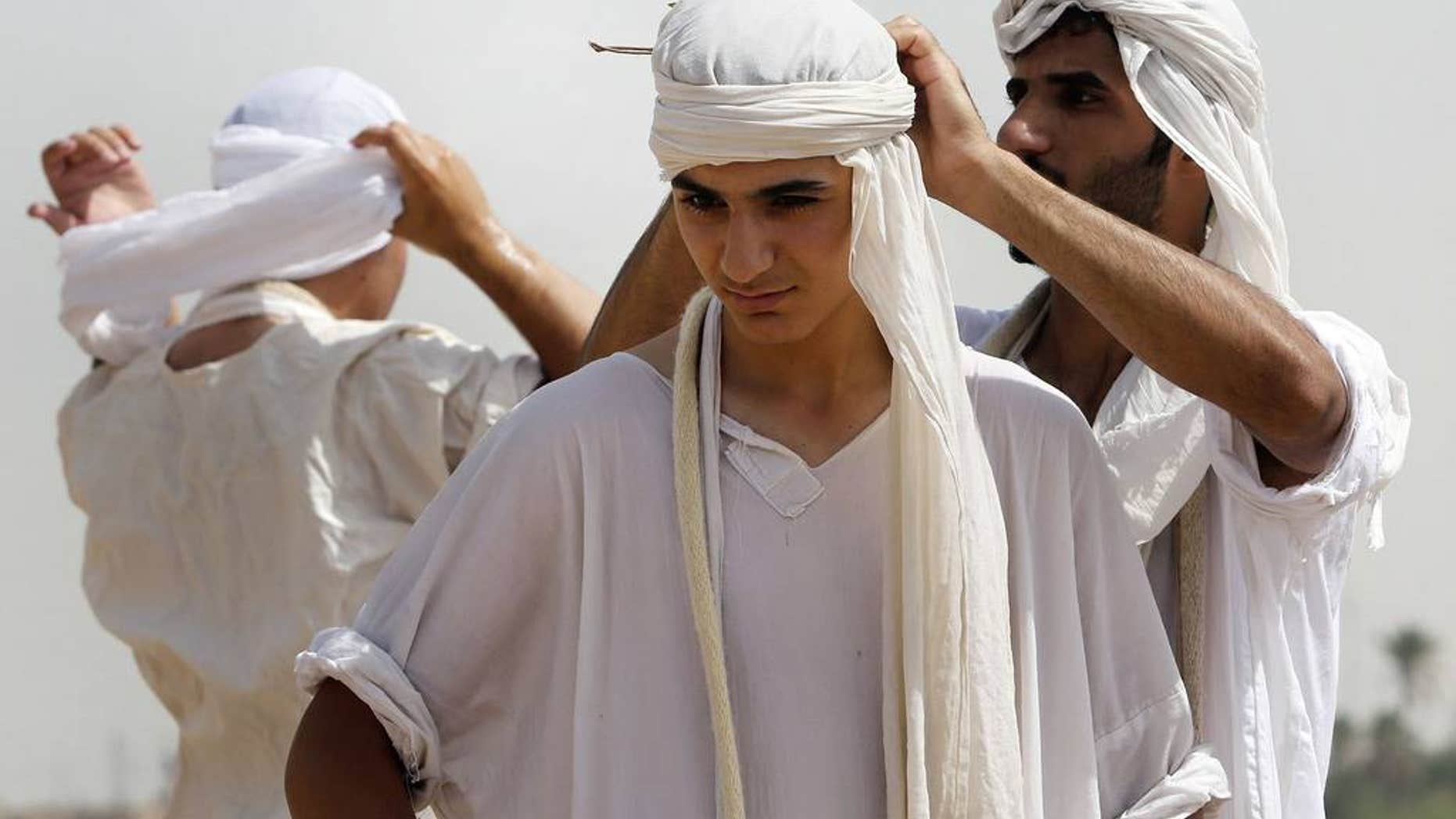 The Baptism Festival in Basra, Iraq. (AP Photo/ Nabil al-Jurani)