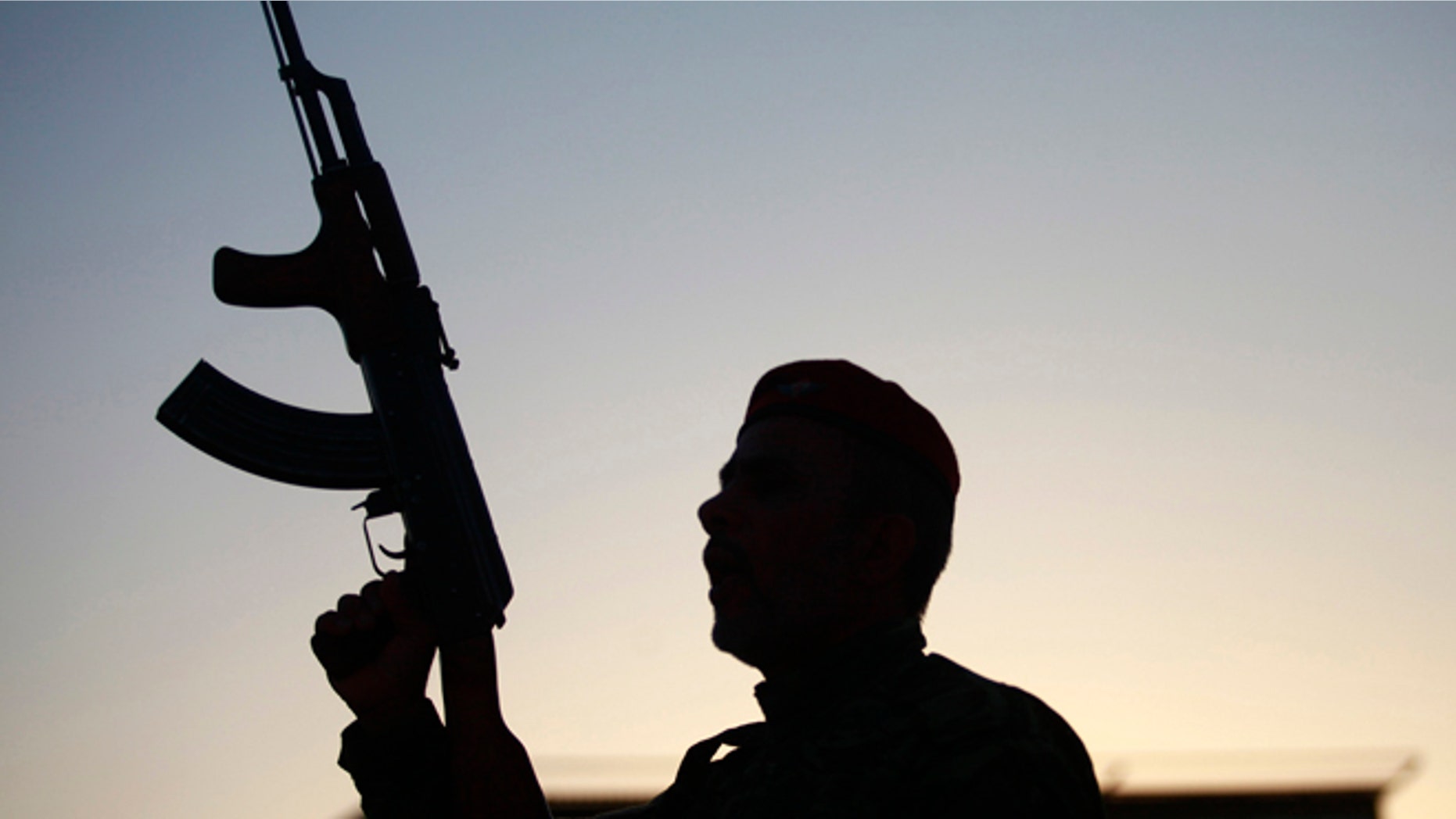 June 26, 2014: A member of an Iraqi volunteer forces group joins training near the Imam Ali shrine in the southern holy Shiite city of Najaf, Iraq.