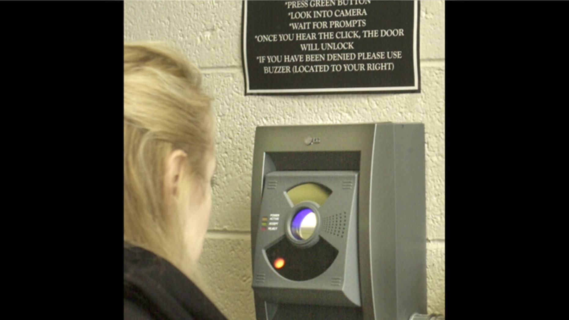 An iris-recognition scanner is used to gain entrance to a New Egypt, N.J., elementary school in 2003.