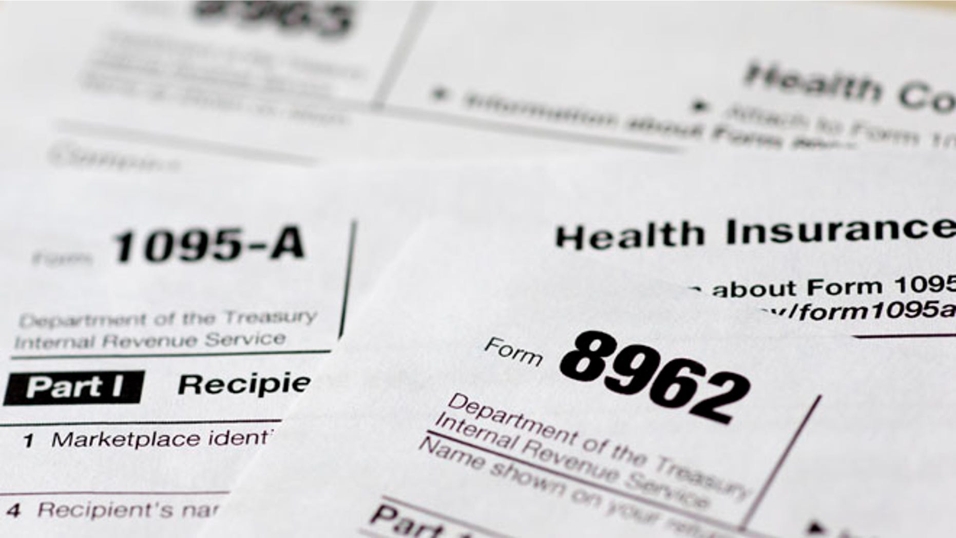 FILE: Health care tax forms 8962, 1095-A, and 8965, in Washington, D.C. (AP)