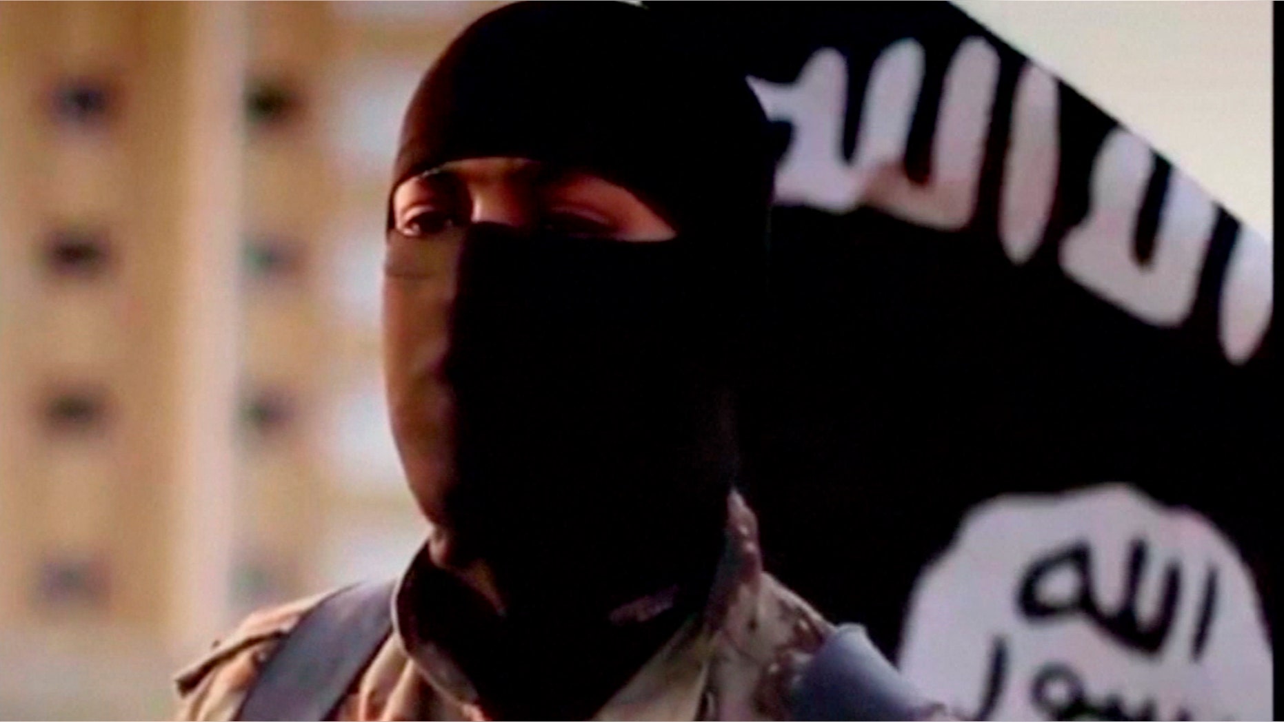 Oct. 8, 2014: A masked man speaking in what is believed to be a North American accent