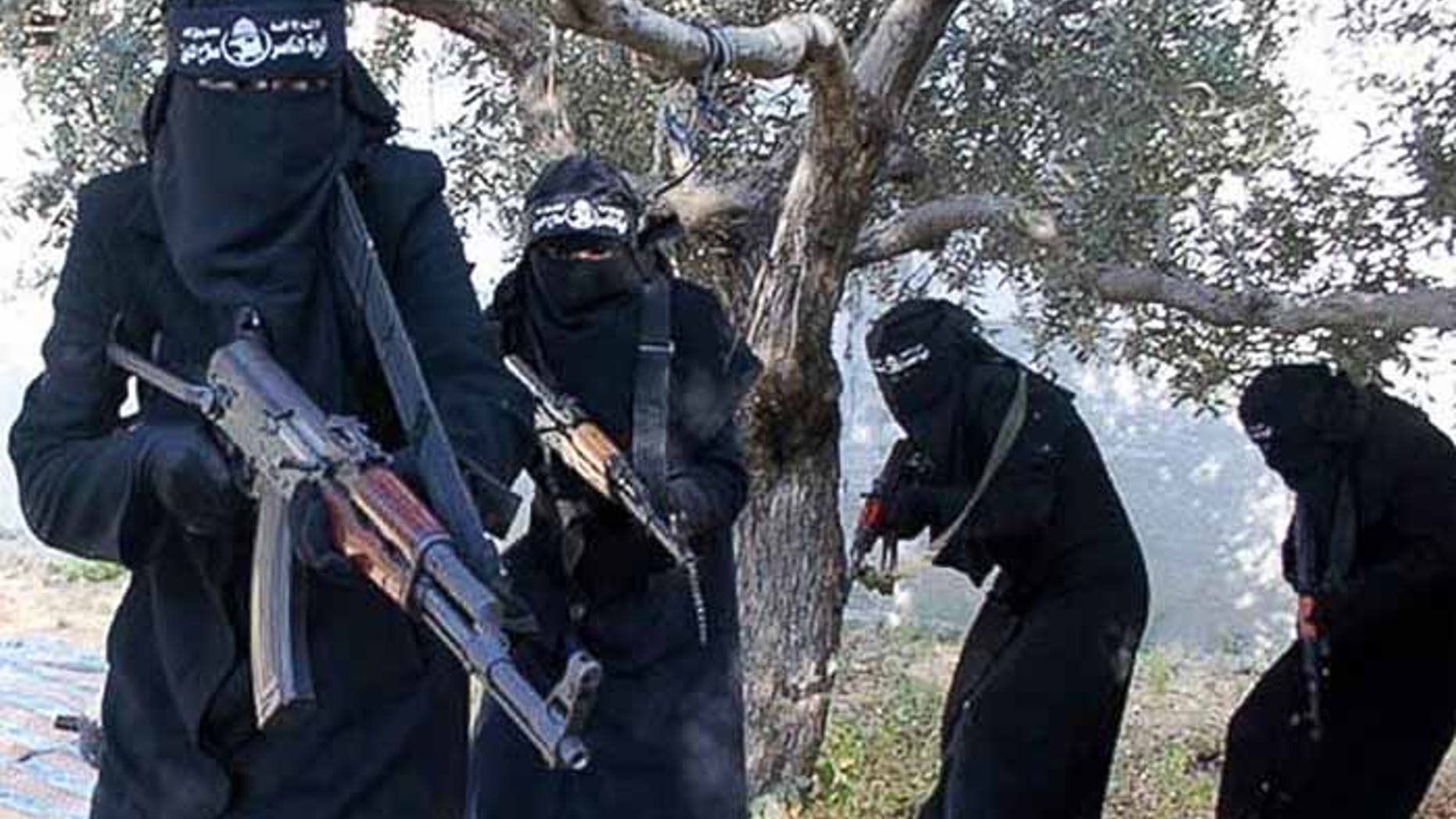 A brigade of women enforce Sharia law in the Islamic State stronghold of Raqqa. (Reuters)