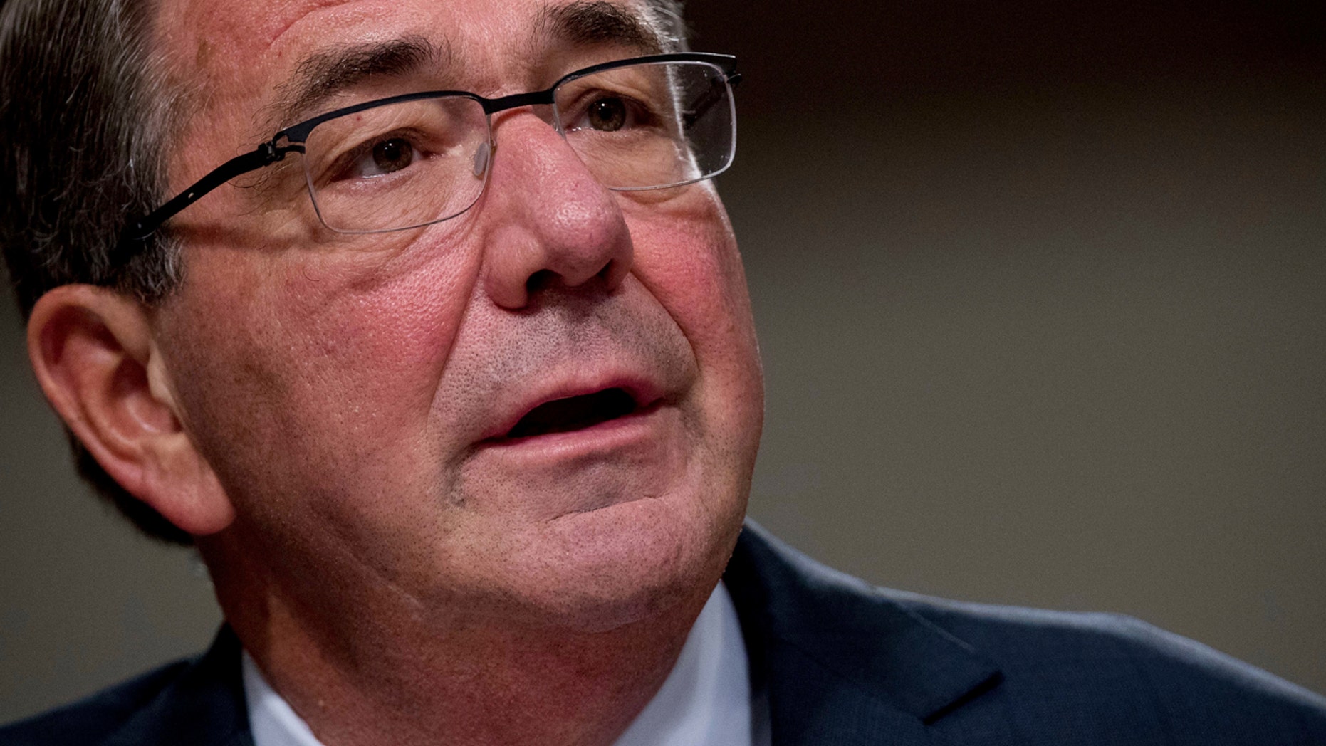 FILE - In this Sept. 22, 2016 file photo, Defense Secretary Ash Carter testifies on Capitol Hill in Washington. U.S. Defense Secretary Ash Carter said Saturday that as many as 200 more American troops are being sent to Syria to help Kurdish and Arab fighters capture the Islamic State group's key stronghold of Raqqa.