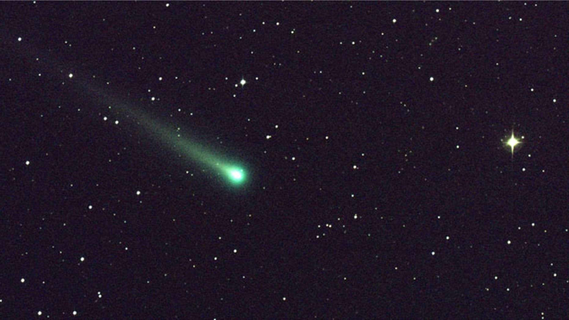 In this photo provided by NASA, Comet ISON shines in this five-minute exposure taken at NASA's Marshall Space Flight Center on Nov. 8, 2013 at 5:40 a.m. EST. At the time of this picture, Comet ISON was 97 million miles from Earth, heading toward a close encounter with the sun on Nov. 28. Located in the constellation of Virgo, it is now visible in a good pair of binoculars.